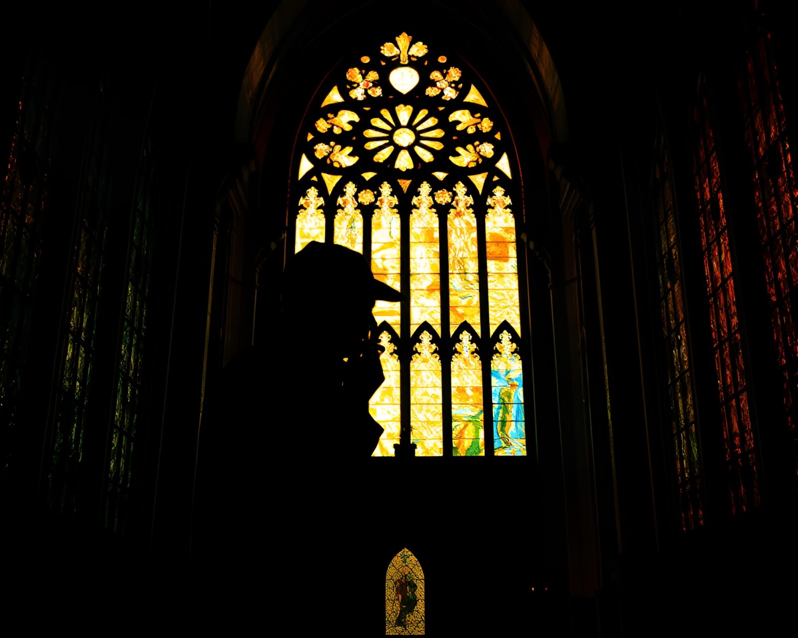 Grisaille image of Sherlock Holmes figure in cathedral glow