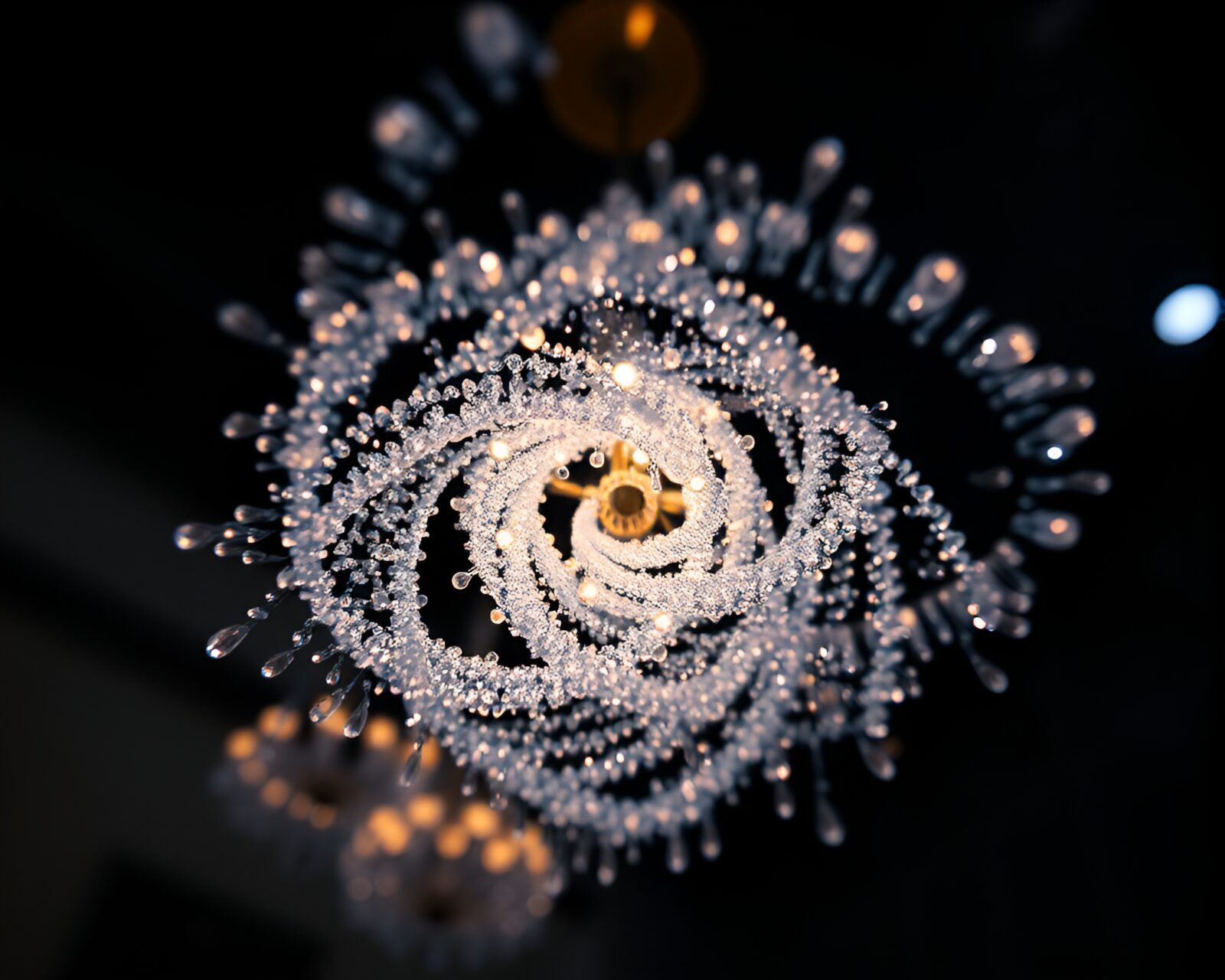 Surreal miniature crystal chandelier in ambient occlusion lighting.