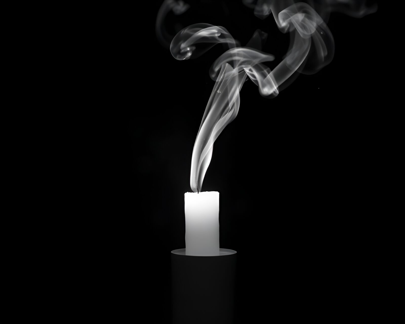 Monochrome image of a candle smoke enveloped wormhole generator