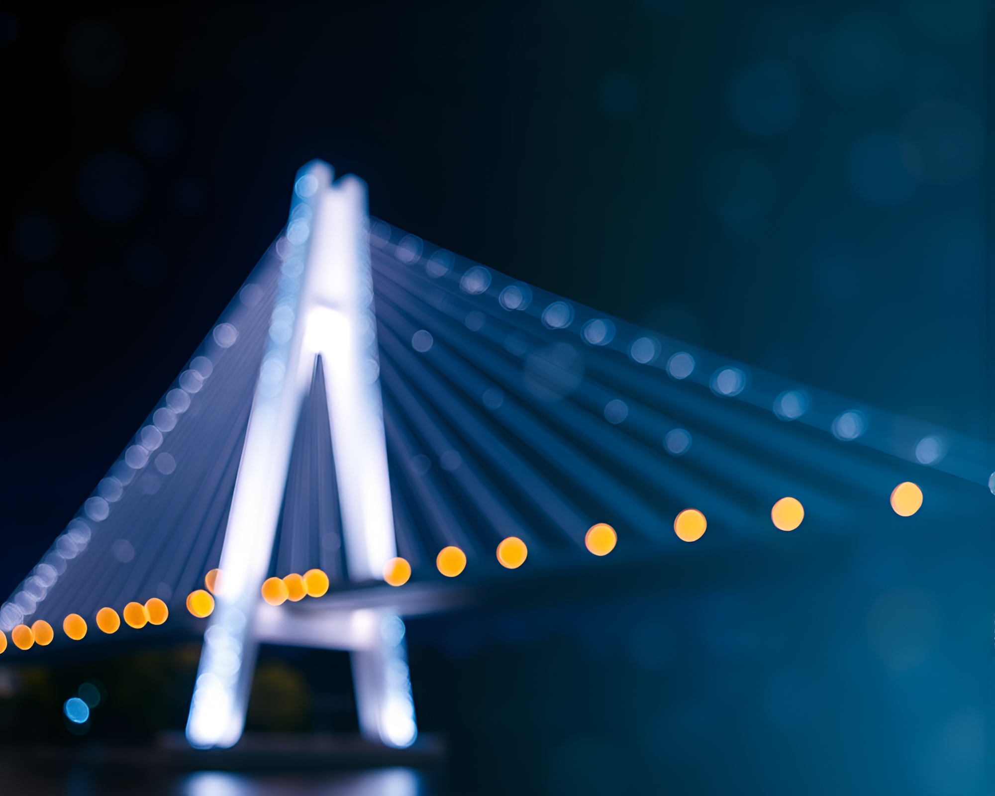 Sapphire Suspension Bridge under Acrylic Spatters Bokeh – free AI stock image