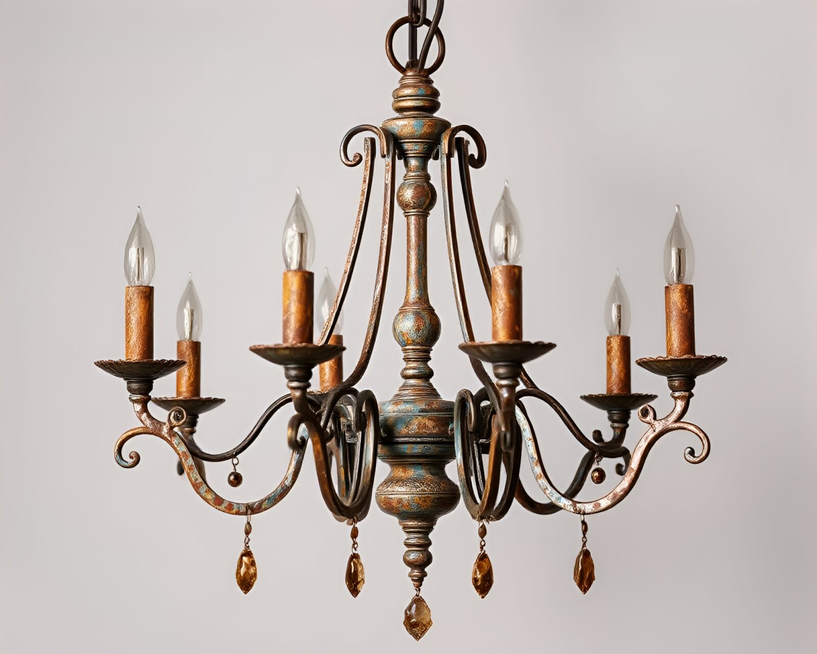 Opulent chandelier in metallic sheen with rust patina colors