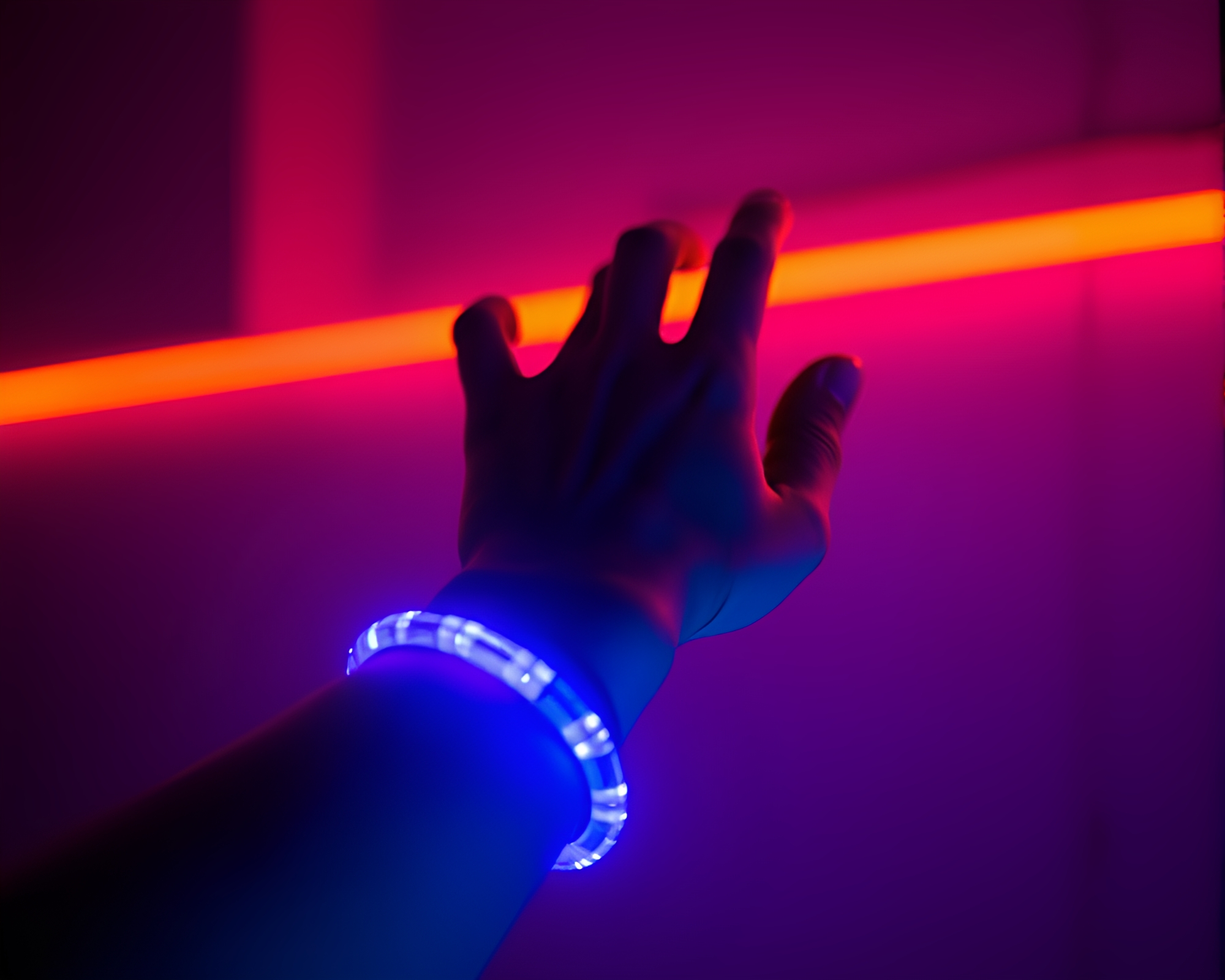 Neon-Lit Bracelet Portrait in Desaturated Gloom – free AI stock image