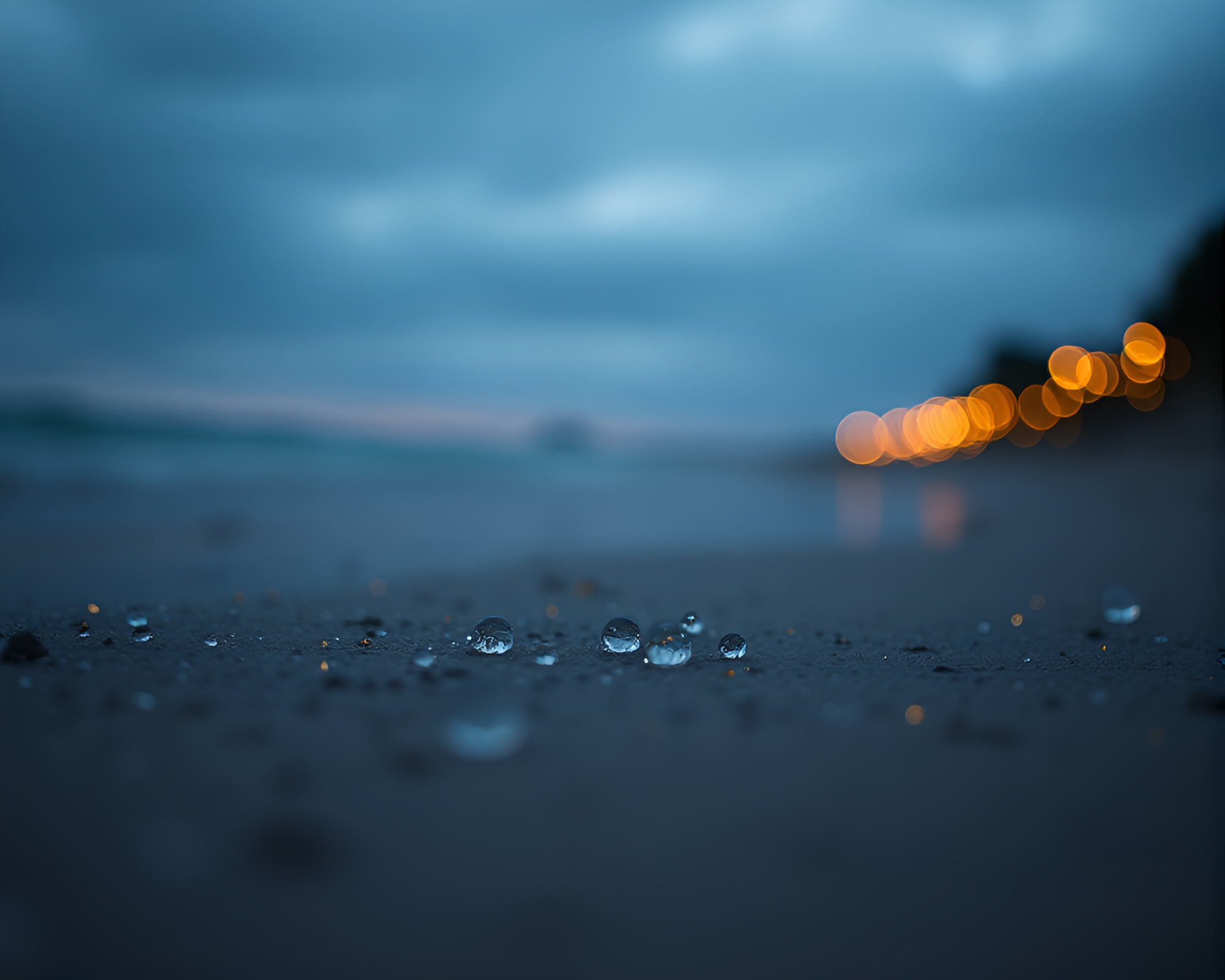 Miniature Beach Scene with Dew Drops under Candlelight – free AI stock image