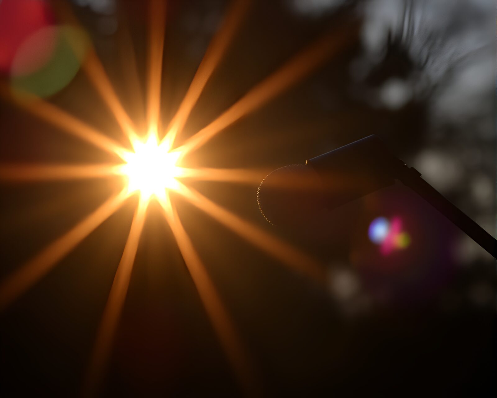 Microphone bathed in warm sun glow by streetlamp