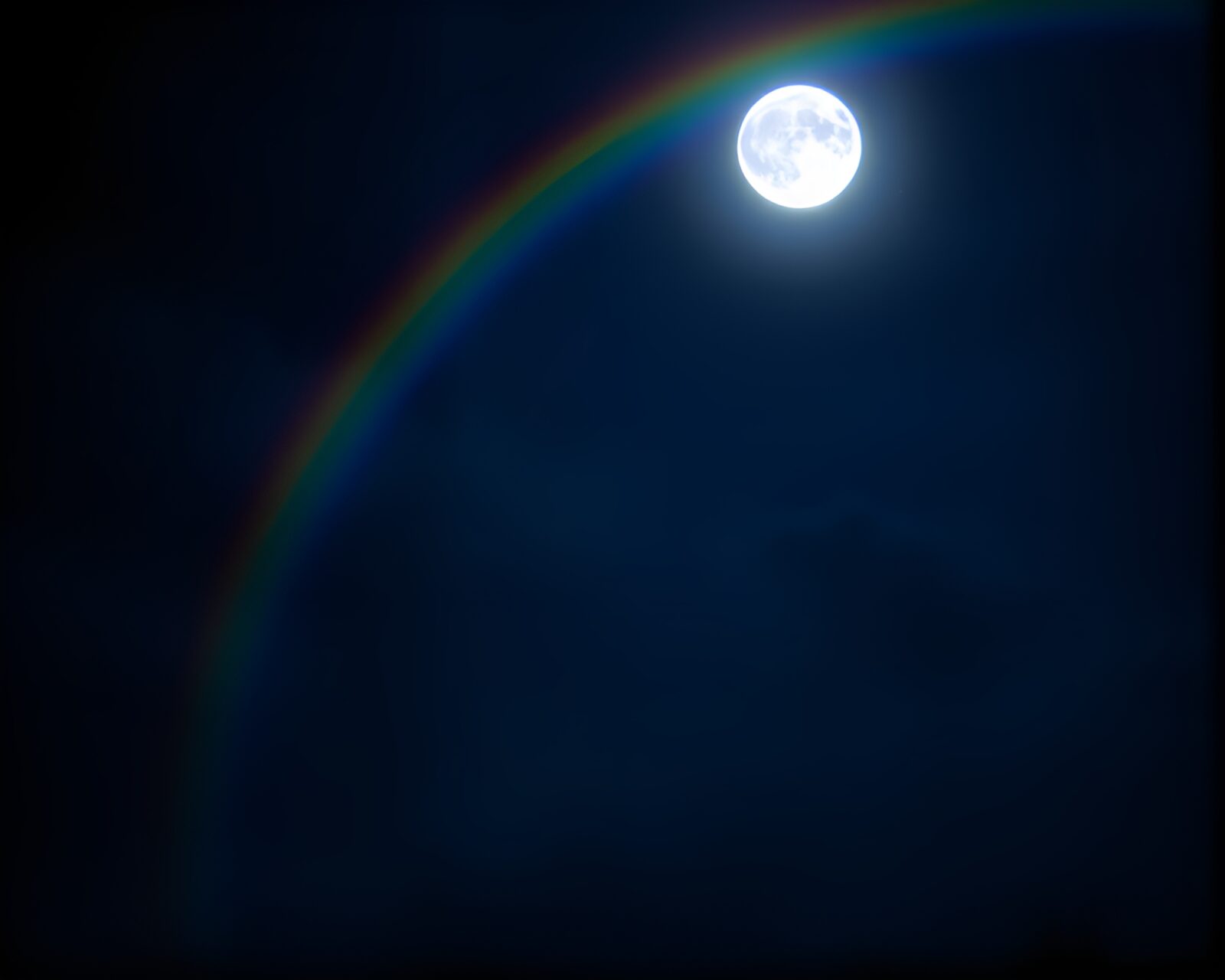 Stained glass optical illusion under moonlight with rainbow colors