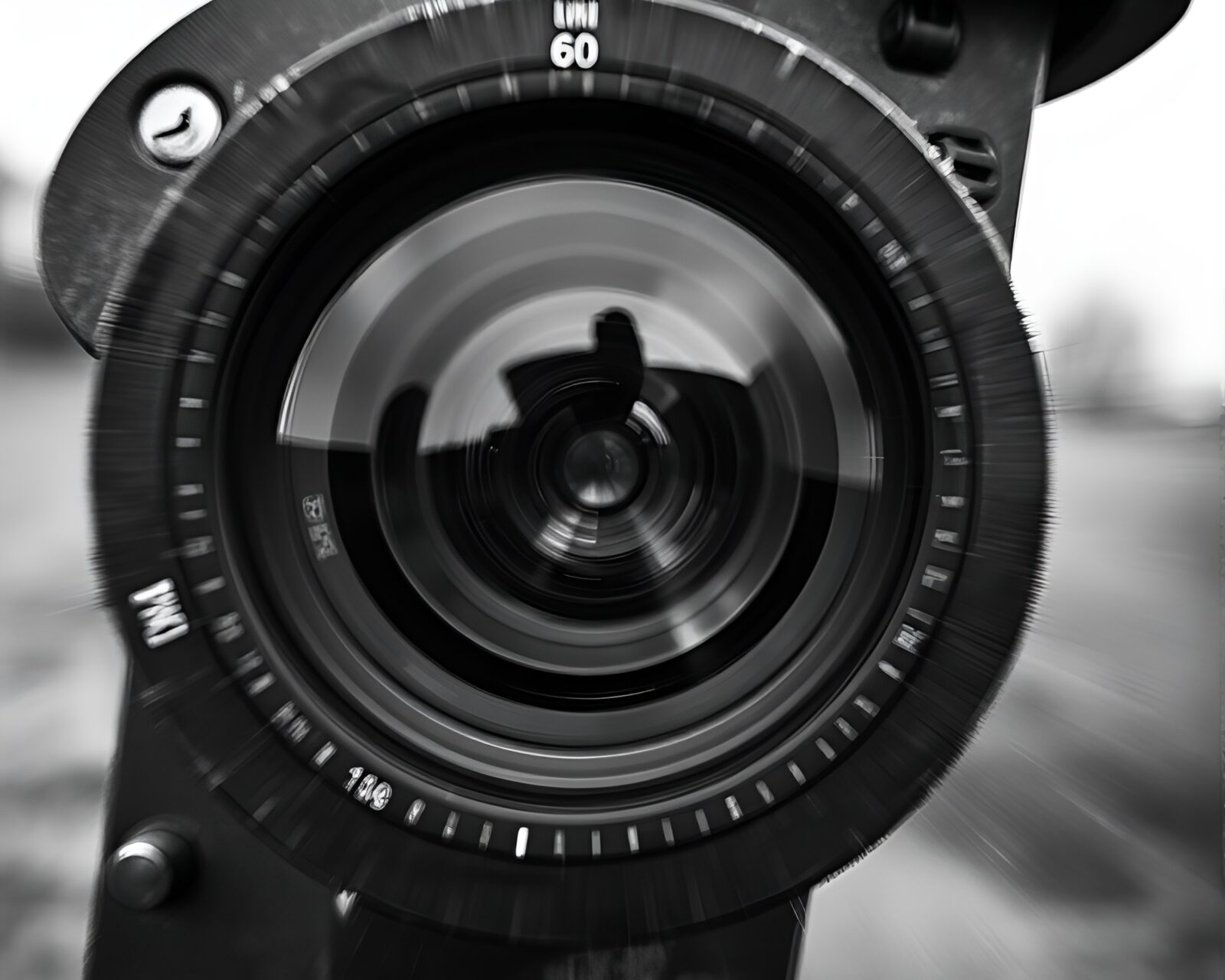 Monochrome image of a rusted pocketknife with lens distortion