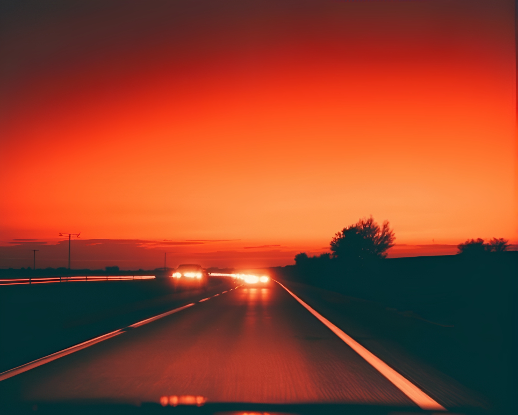 Sunset Shield: Monochrome Car Light Trails Composition – free AI stock image