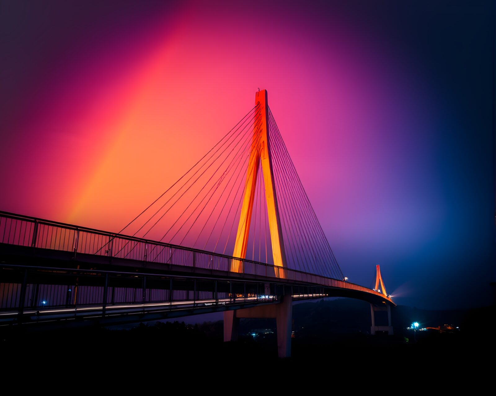 Vibrant slow shutter street art of suspension bridge