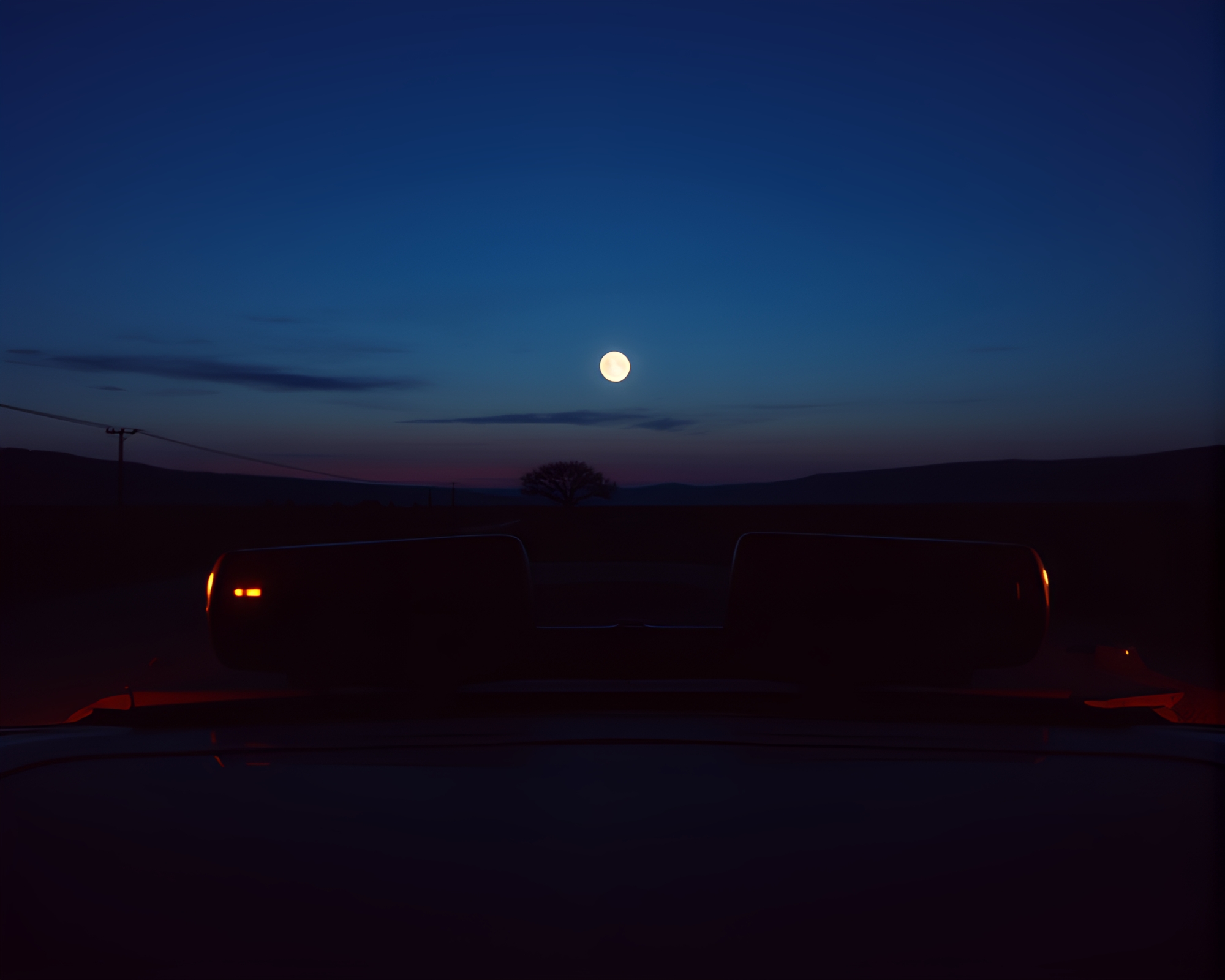 Vintage Car on Cracked Earth at Twilight Blue Hour – free AI stock image