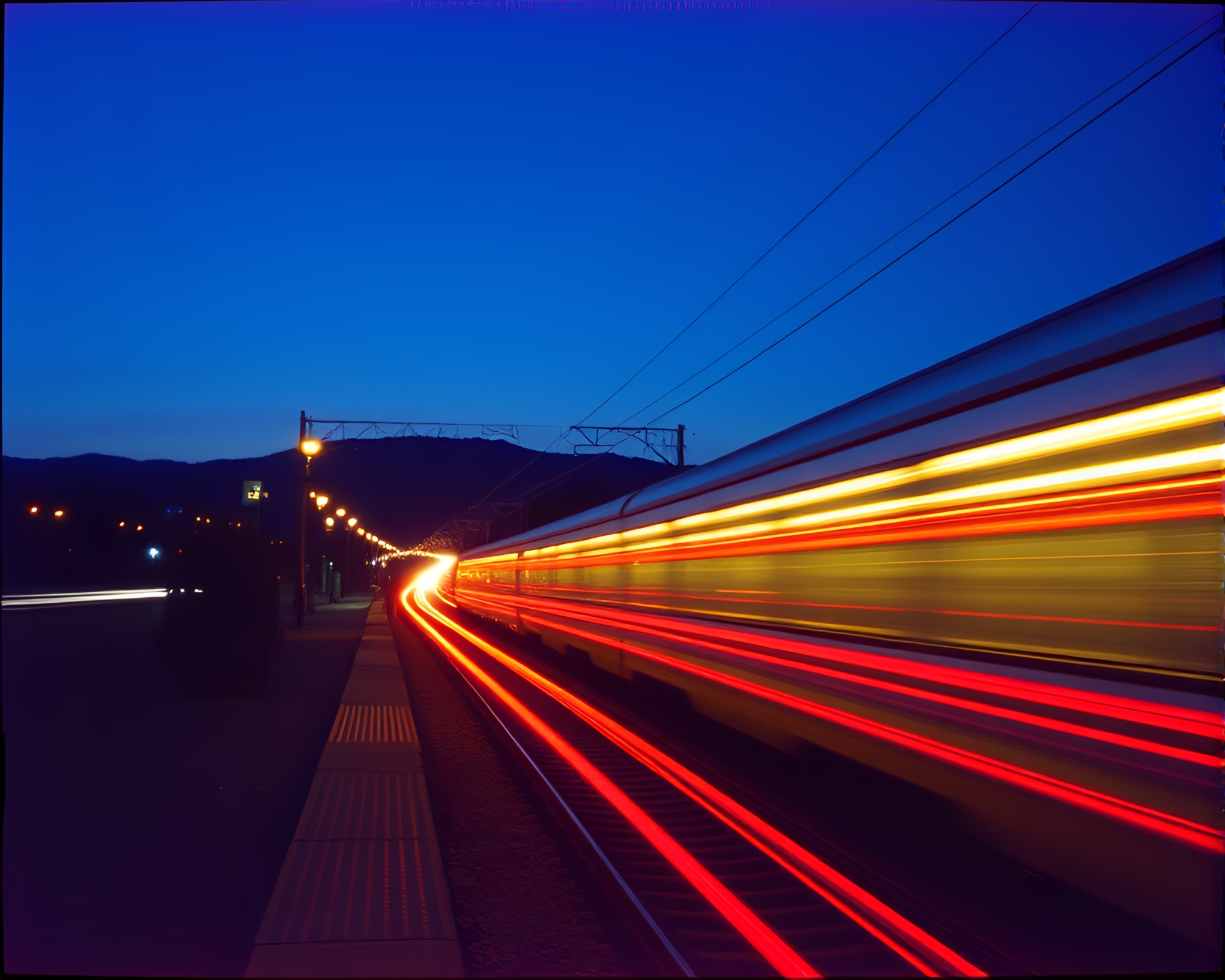 Phoenix Train Light Trails in Expired Film Look – free AI stock image