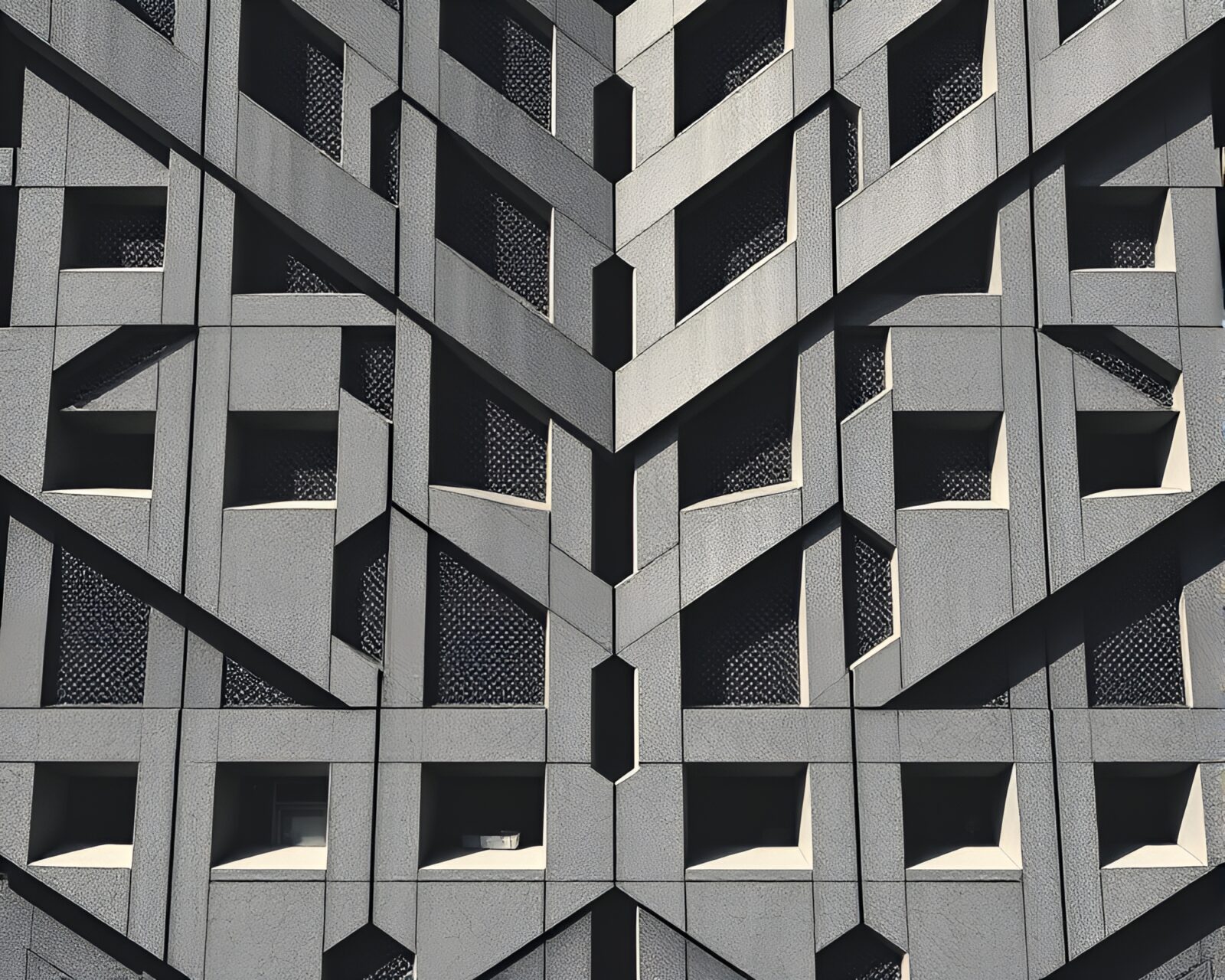 Abstract geometric patterns on a concrete Brutalist building