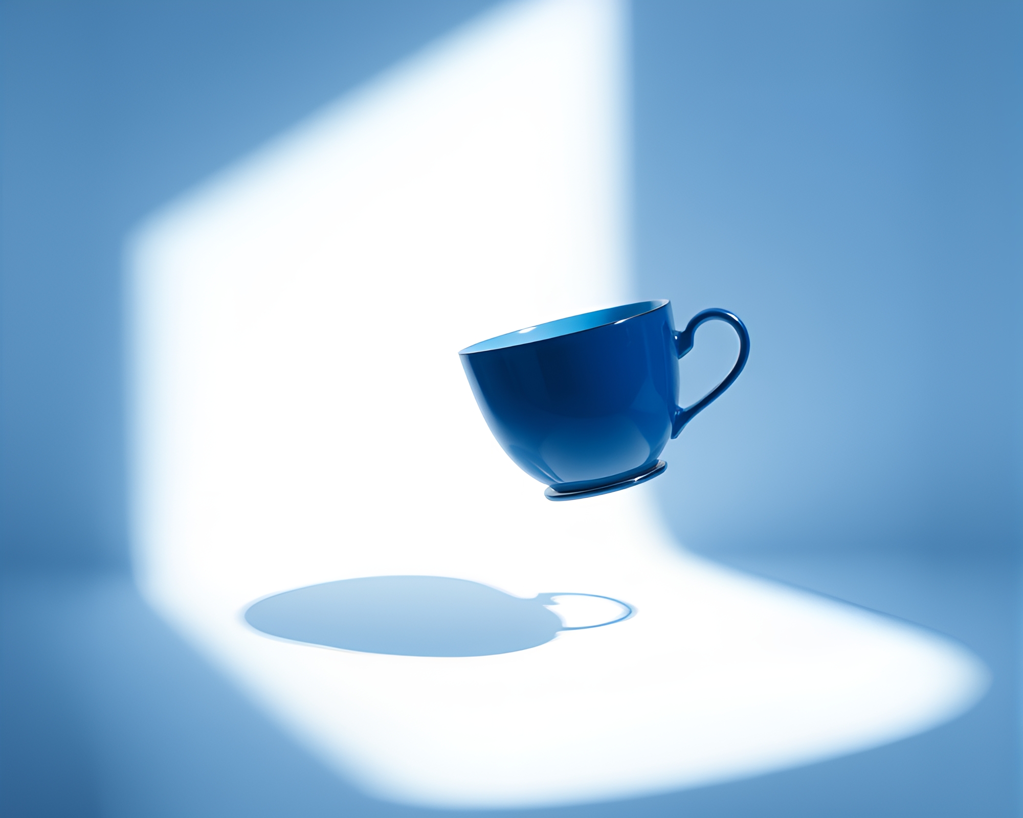 Floating Tea Cup Casting Monochrome Blue Shadows – free AI stock image