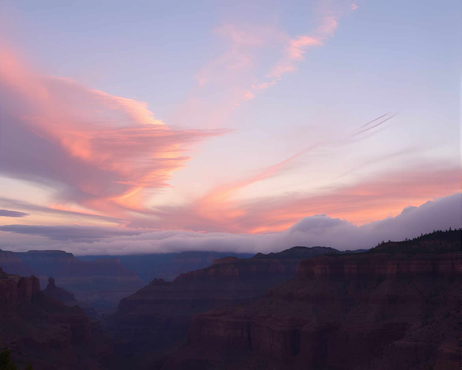 A stunning collage of cosmic clouds over a canyon