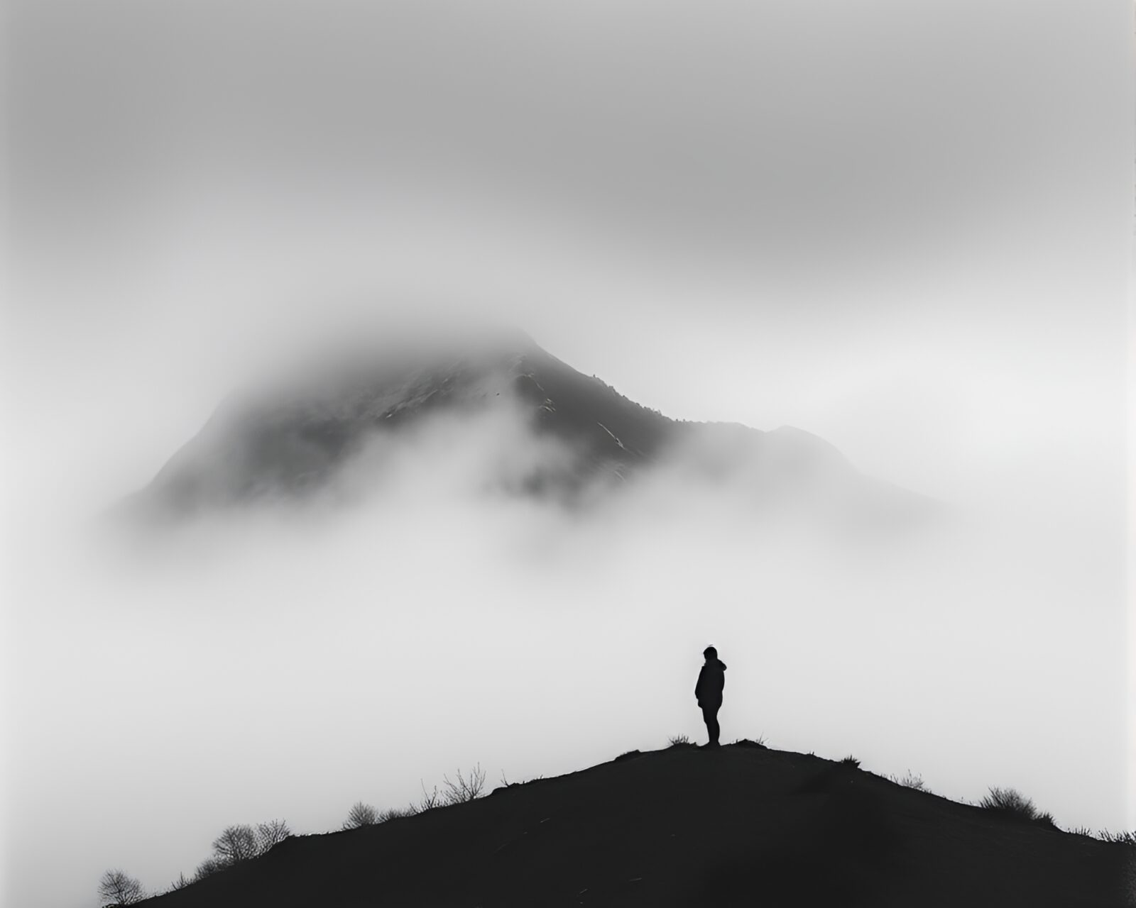 Chalk art of candid moment on mist-shrouded mountain