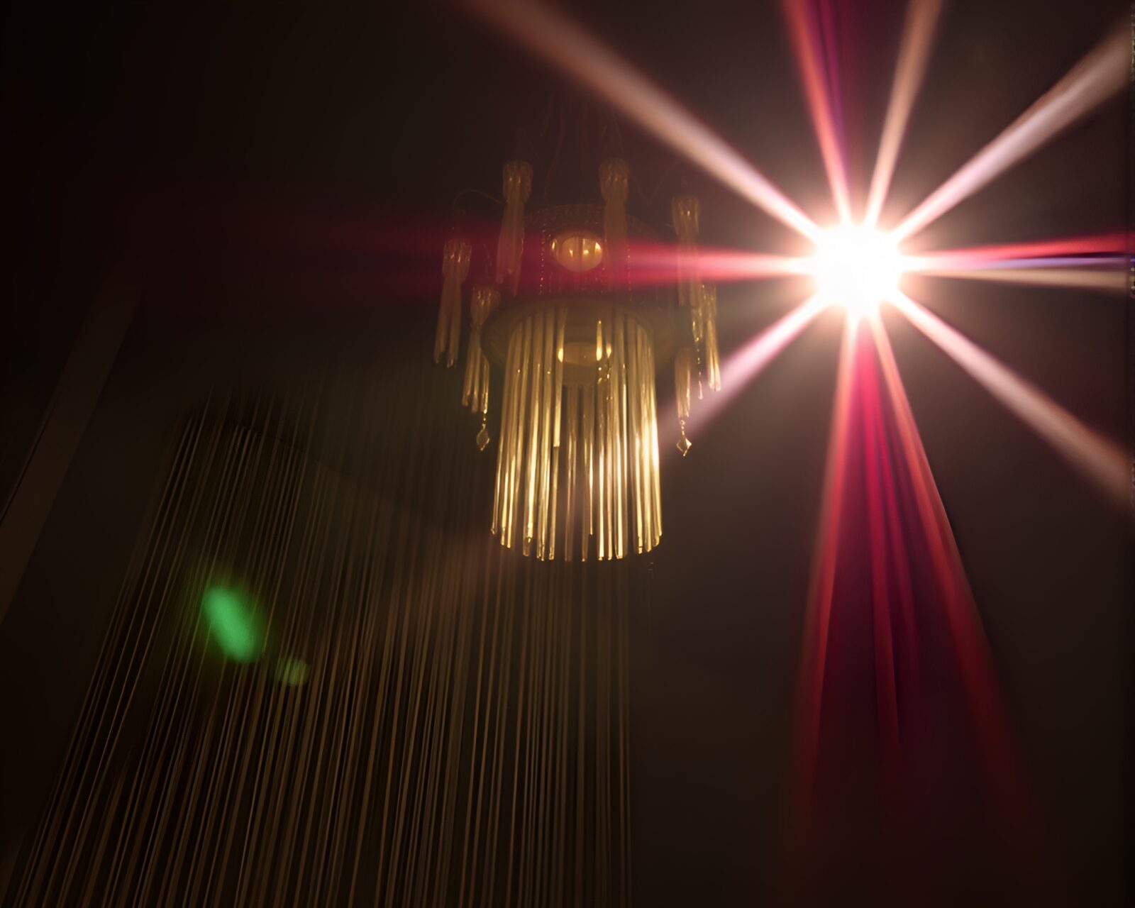 Dark room with glowing barcode stripes and a majestic chandelier