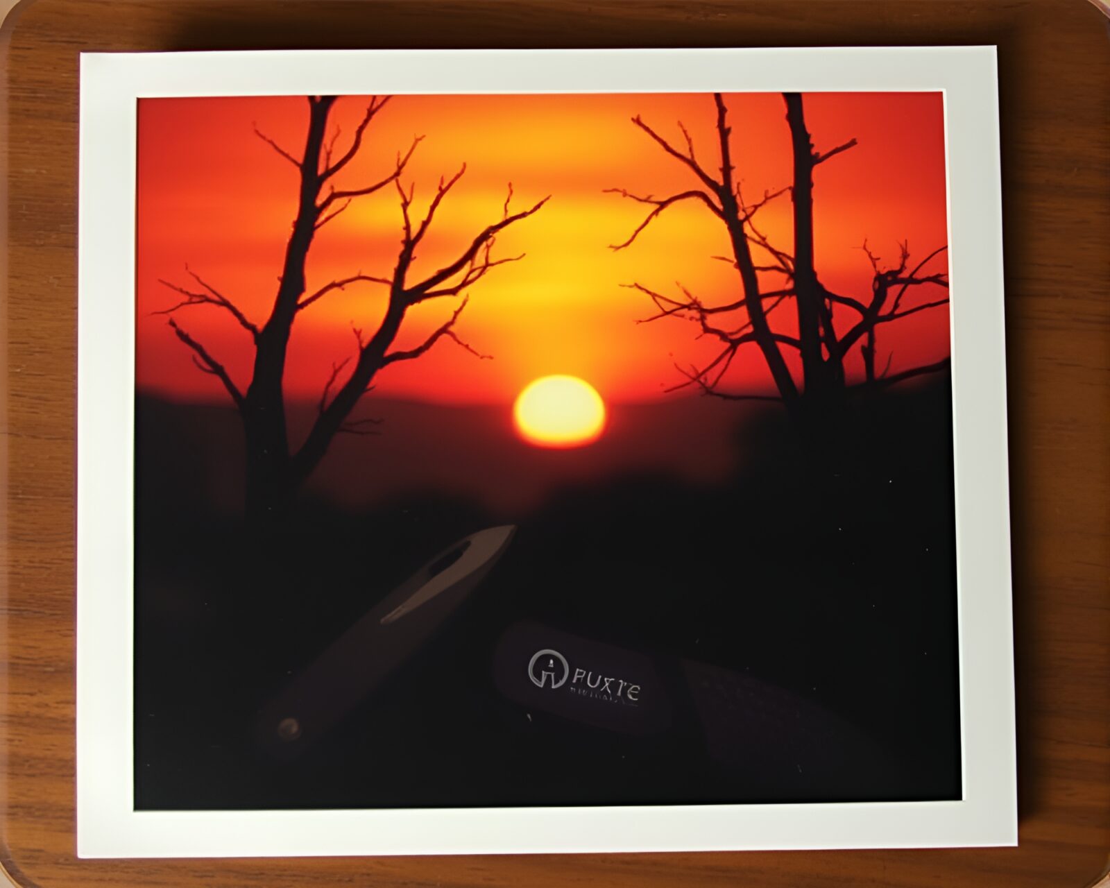 Surreal image of rusty pocketknife in swirling sunset vortex