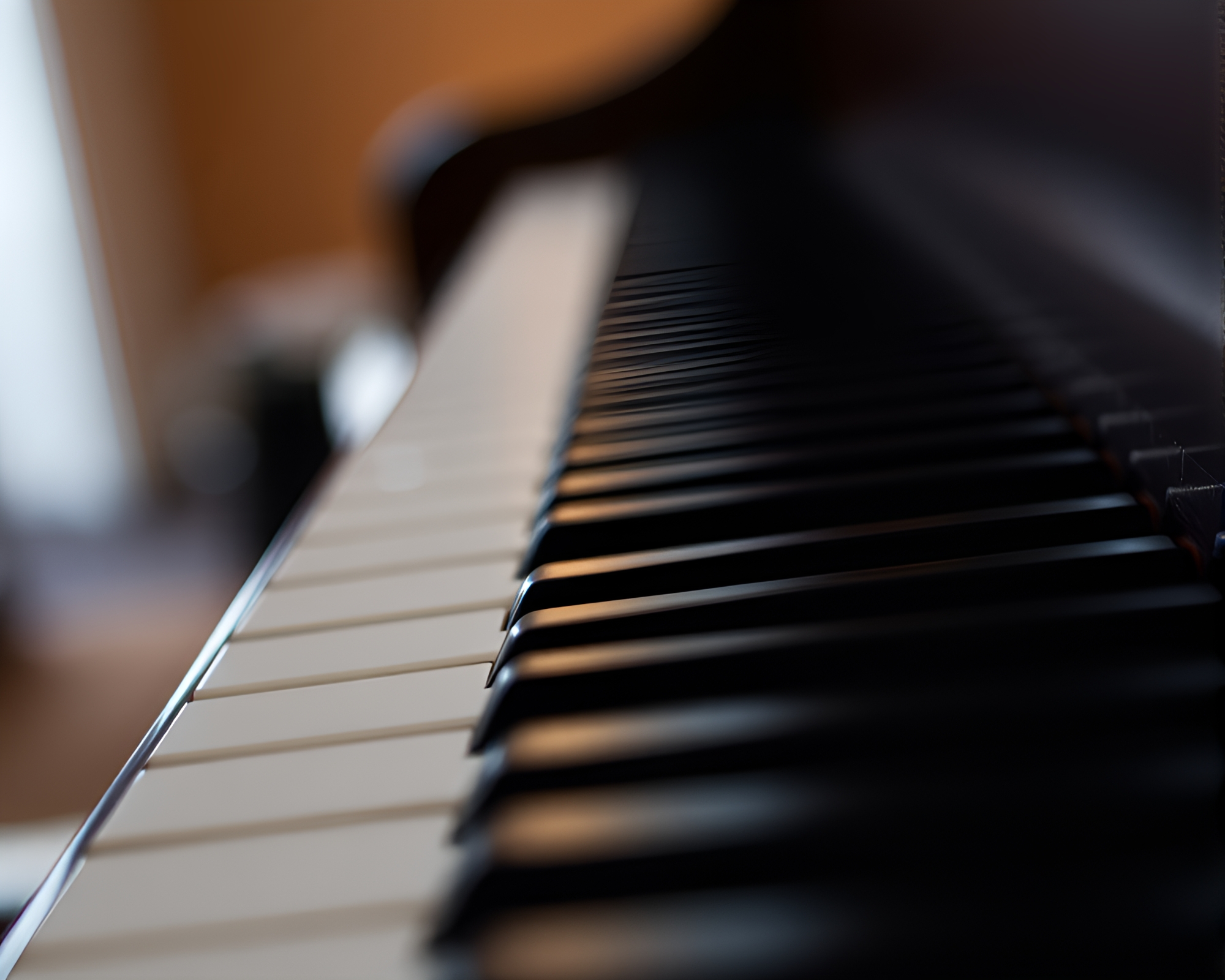 Intimate Piano Keys in Moody Light – free AI stock image