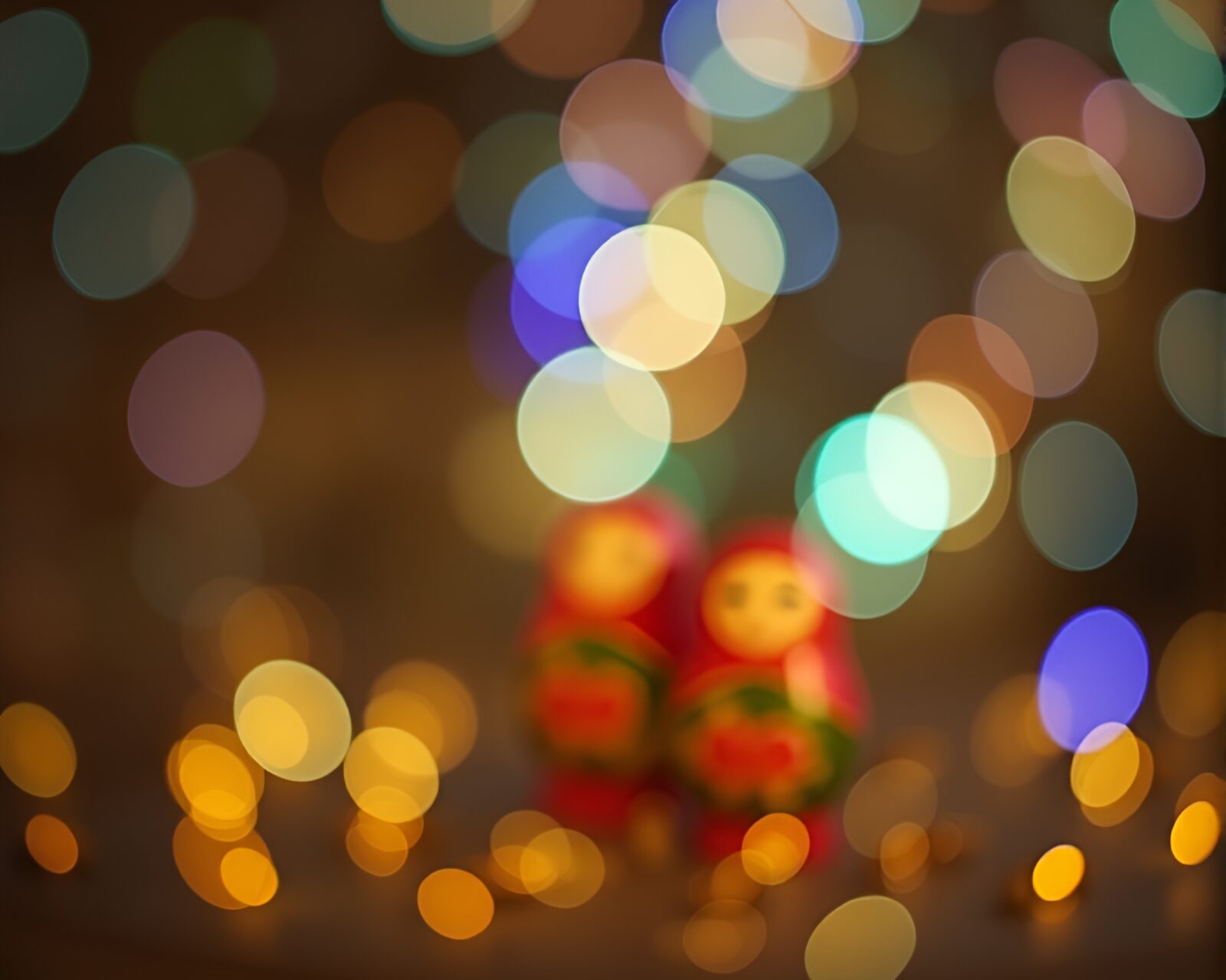 Intimate view of Matryoshka doll with dreamy bokeh foreground