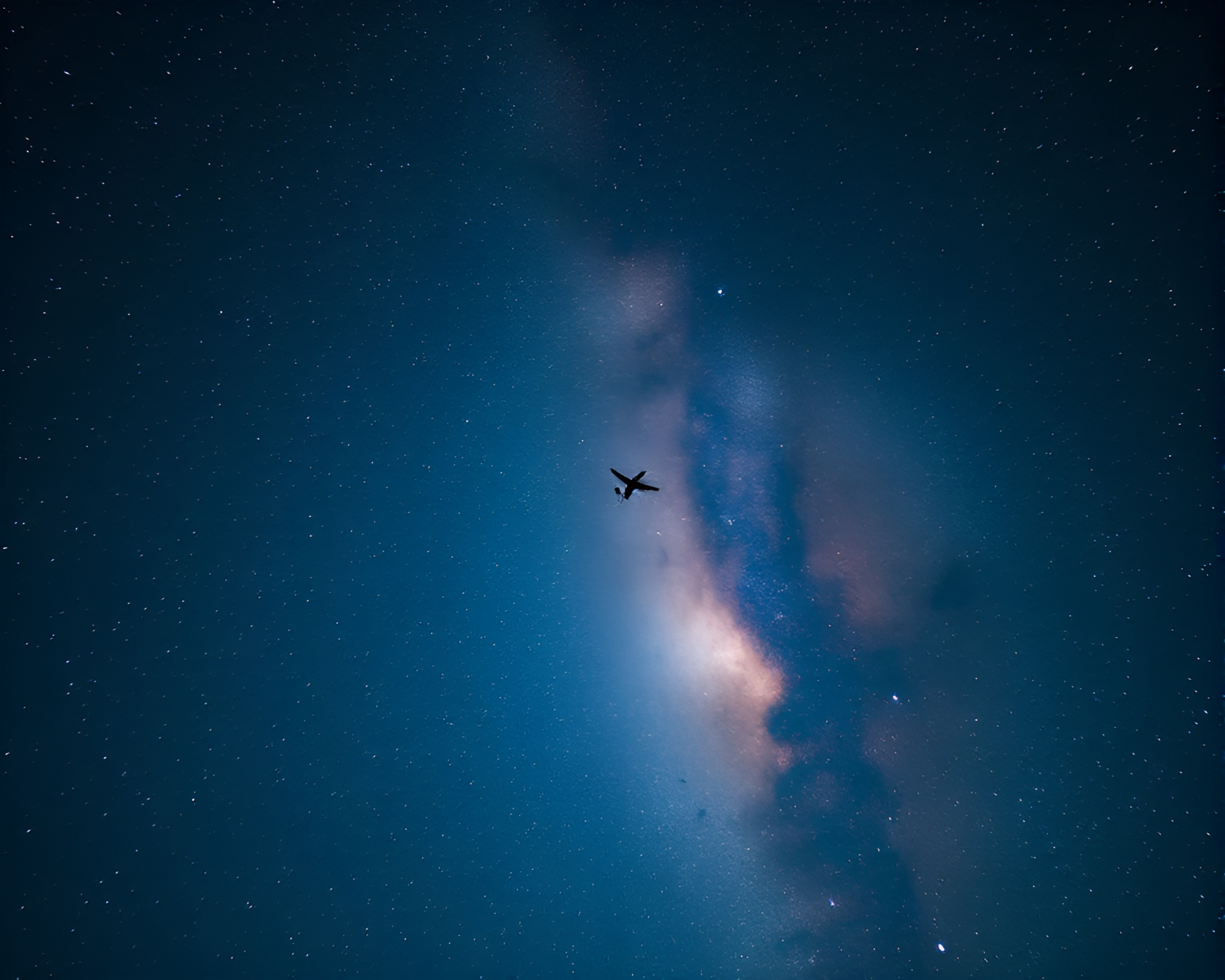 Ethereal Airplane in Milky Way Vignette – free AI stock image