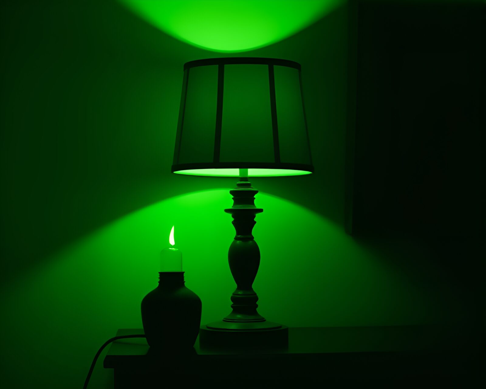 90s-style lamp silhouette with green monochrome lighting