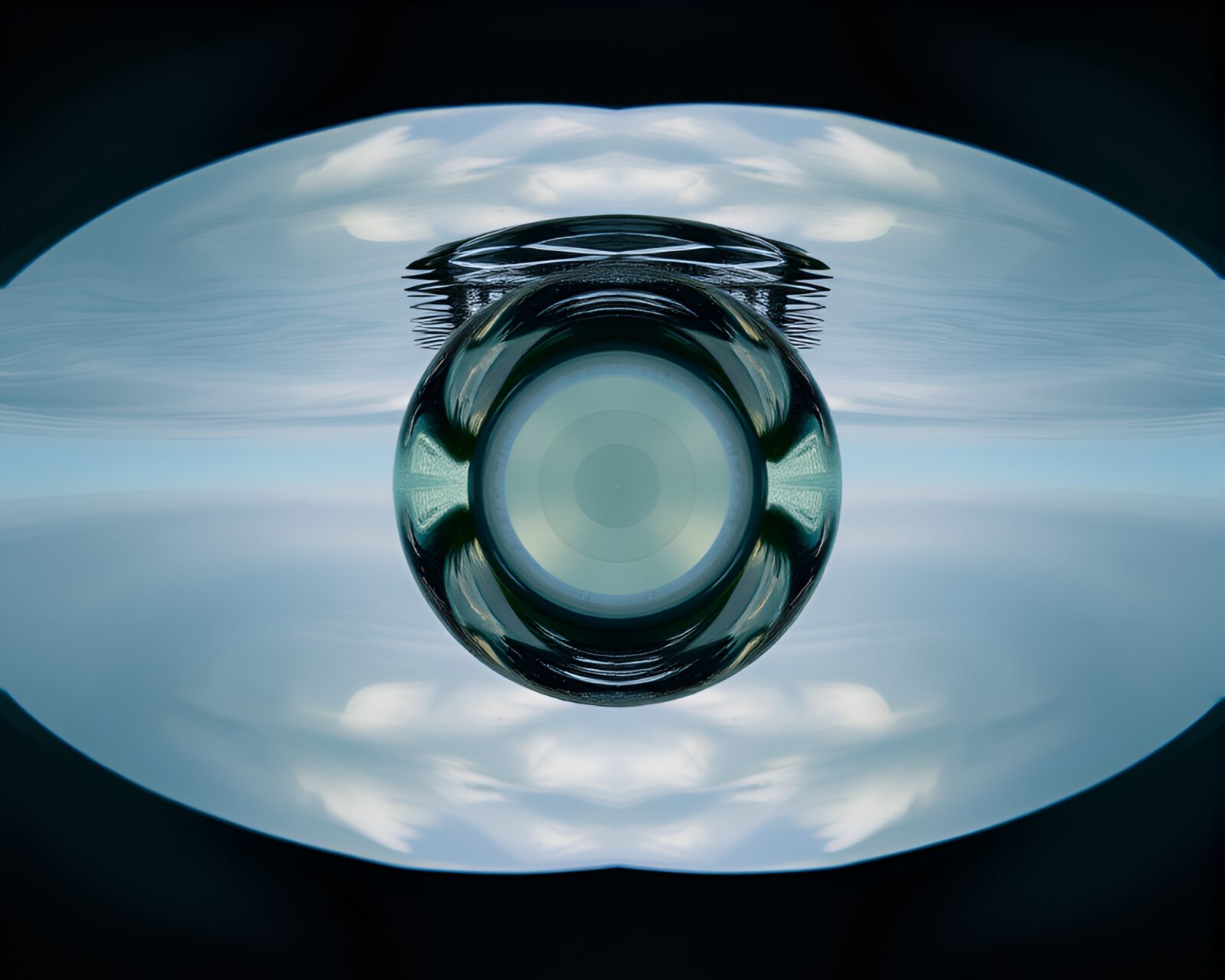 Double reflection of underwater submersible in colorful kaleidoscope pattern