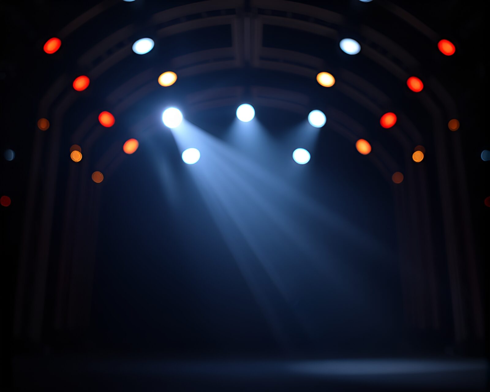 Soft focus glass tunnel with vibrant stage lighting.