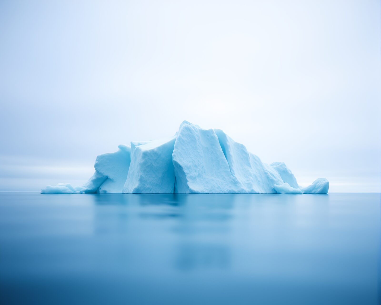 Minimalist design Arctic iceberg with soft focus film grain