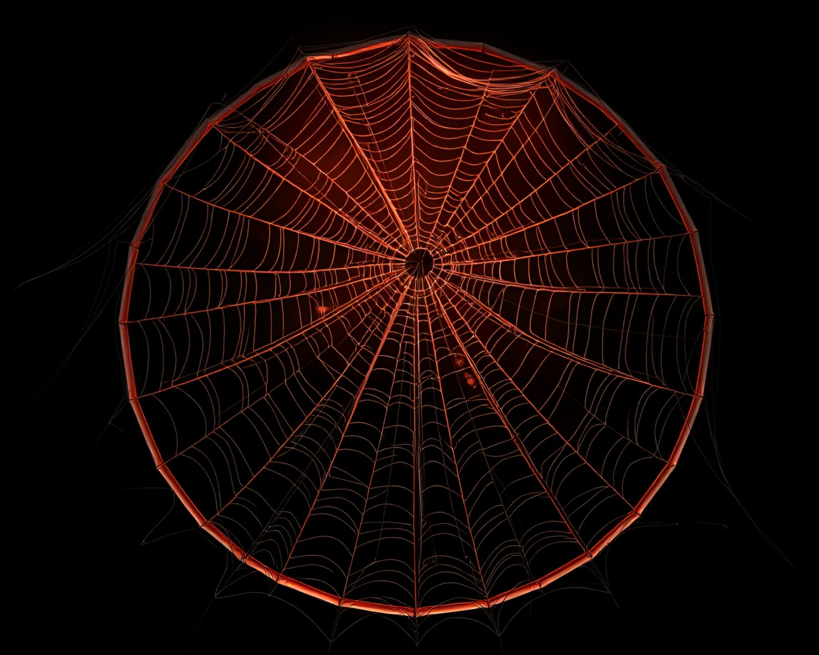 Infrared shot of intricate cobweb strands on vibrant stained glass dome