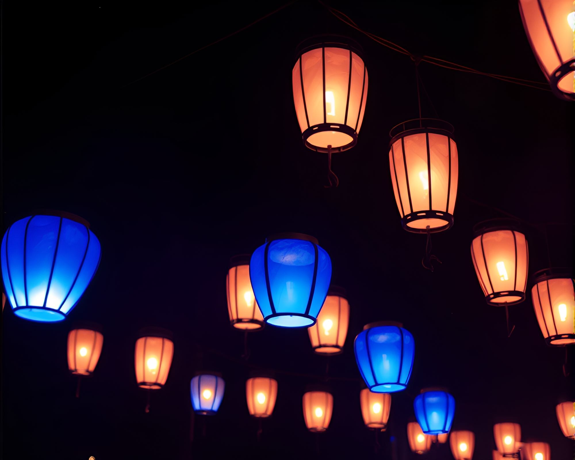 Enchanted Lanterns Floating in Sapphire Dust Overlay – free AI stock image