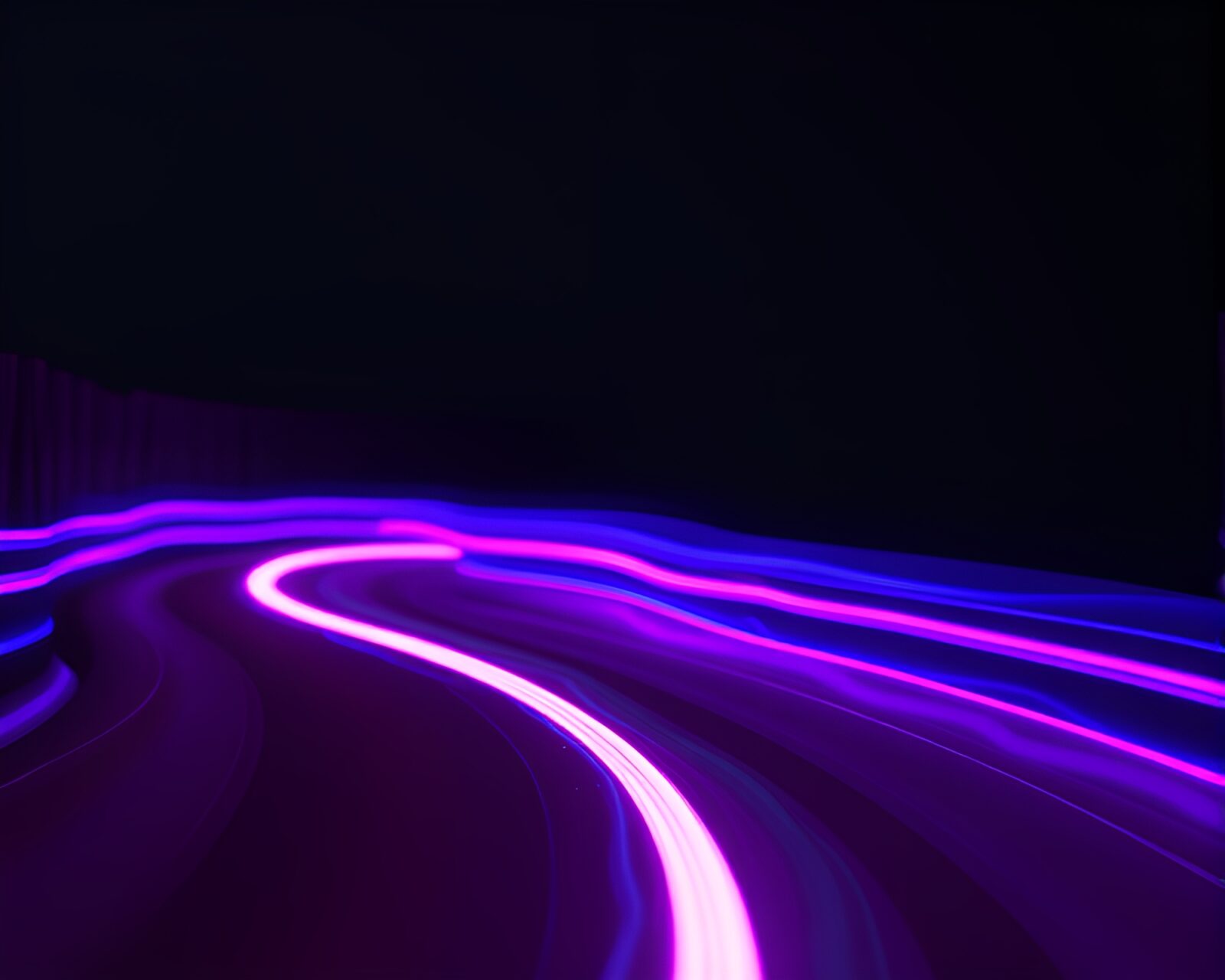 Rustic pottery bathed in soft neon car light trails