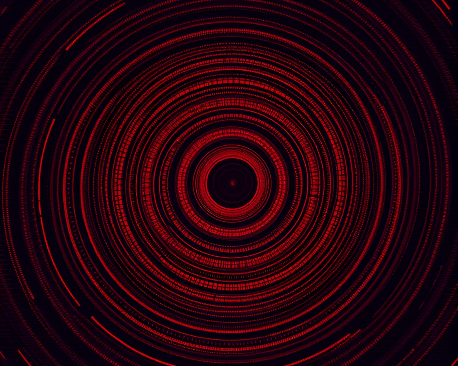 Concentric circles in grainy, glitched red depths