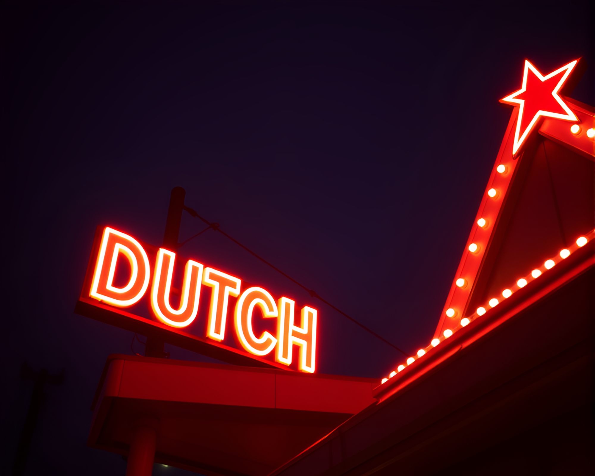 Amsterdam Neon Night with Dutch Angle – free AI stock image