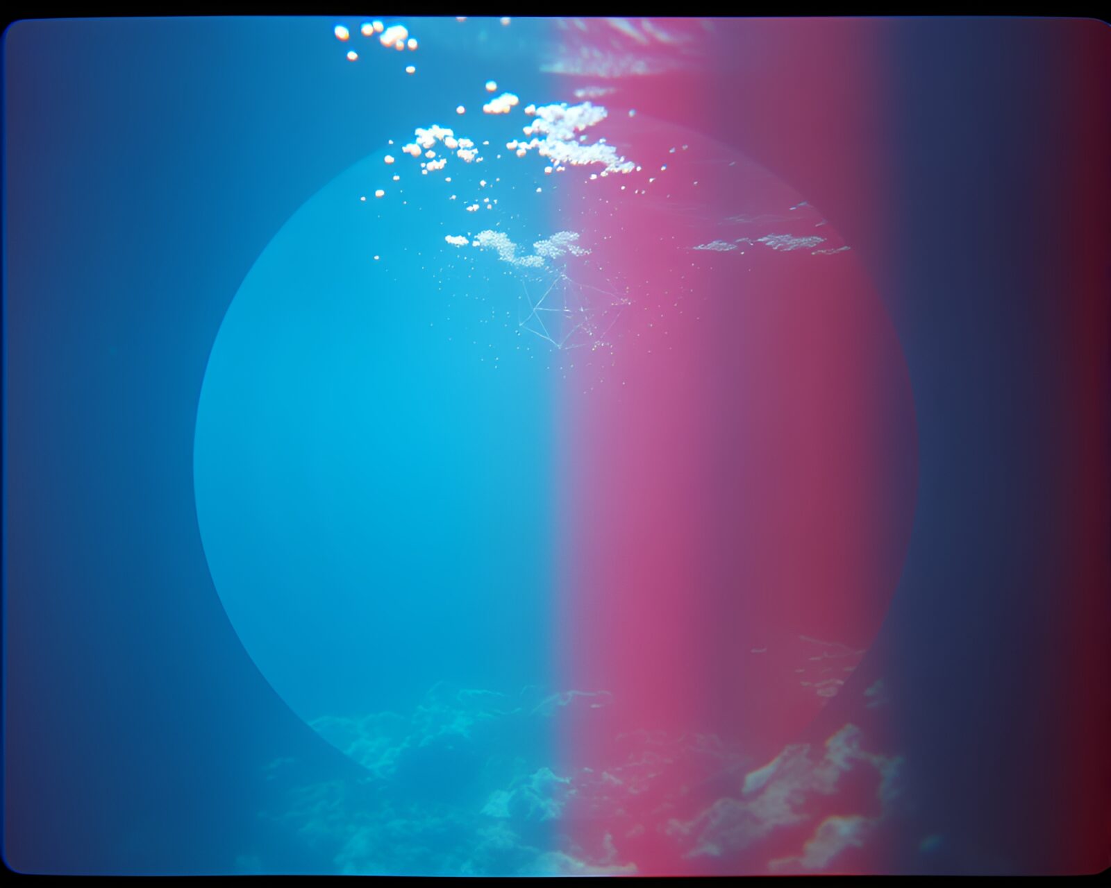 A mesmerizing geometric underwater dome captured with expired film