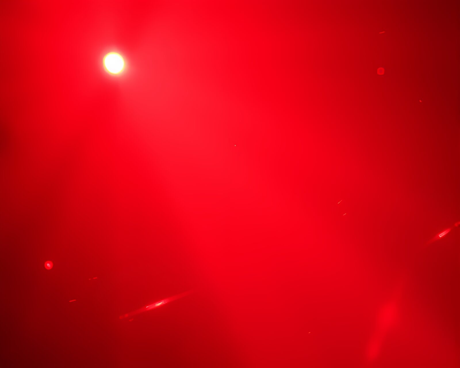A holographic sloth in a brick red glowing haze