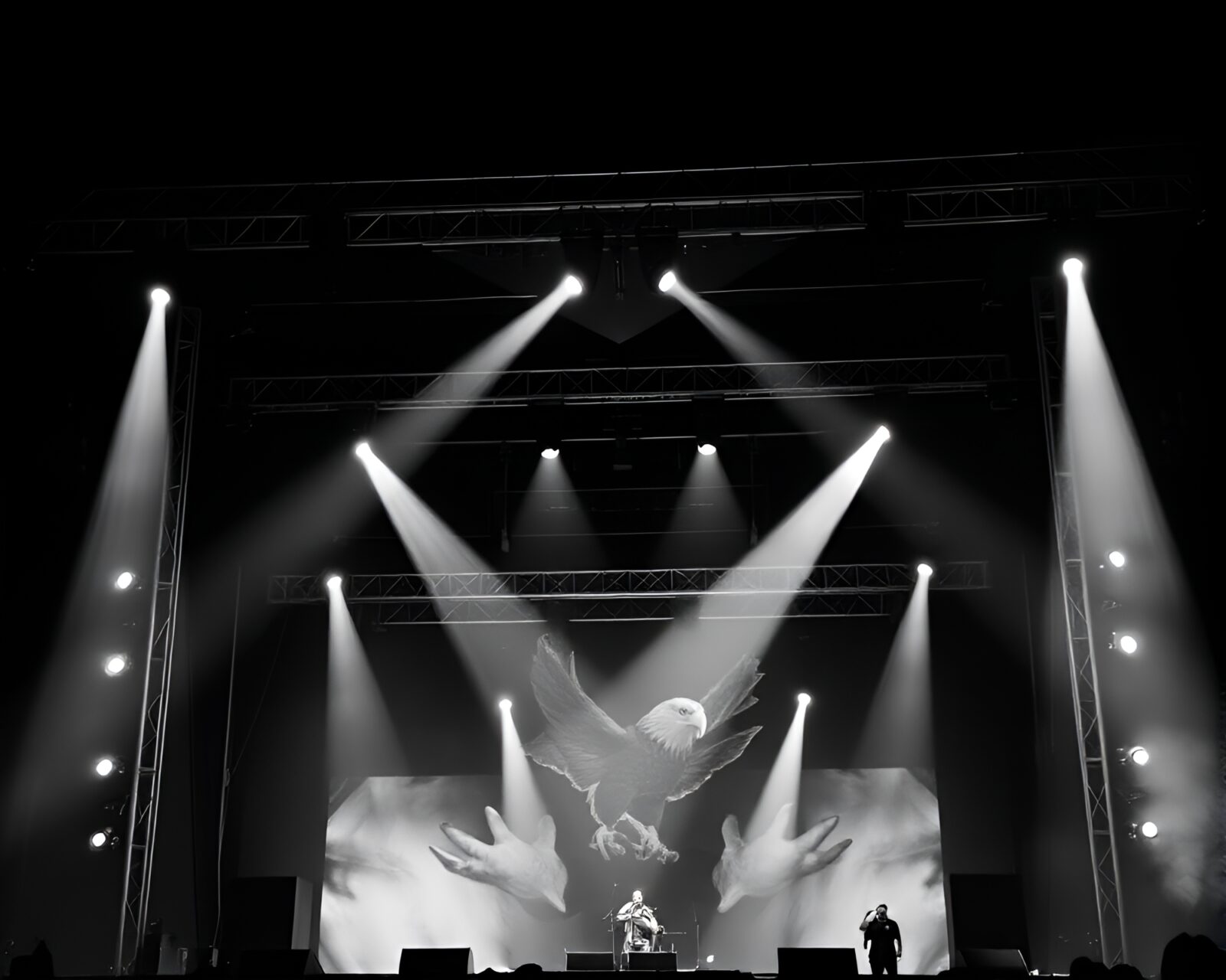 Majestic eagle illuminated by concert stage lights in forest