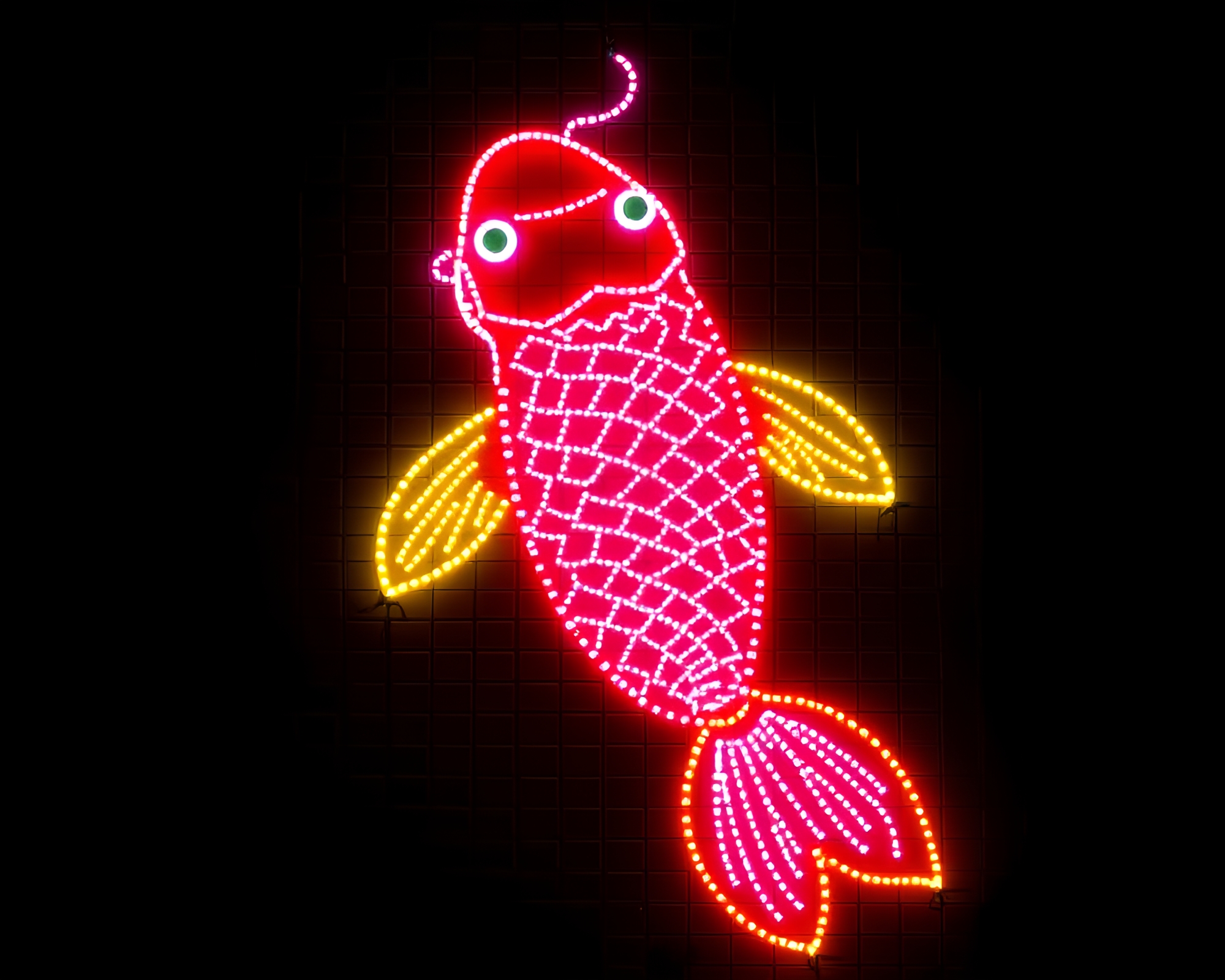 Neon Koi Fish in LED Pixel Grid Torchlight Glow – free AI stock image