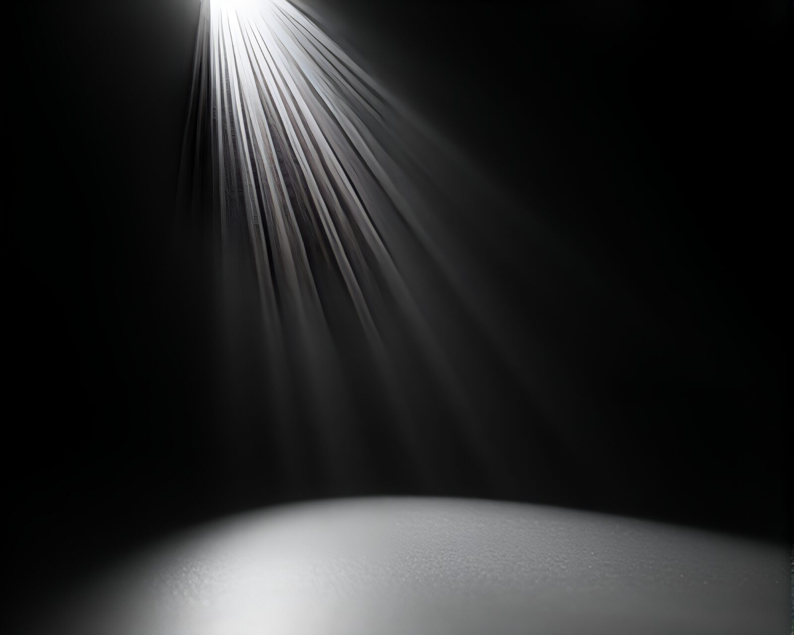 Sculptural vase in softbox light amidst dramatic lines