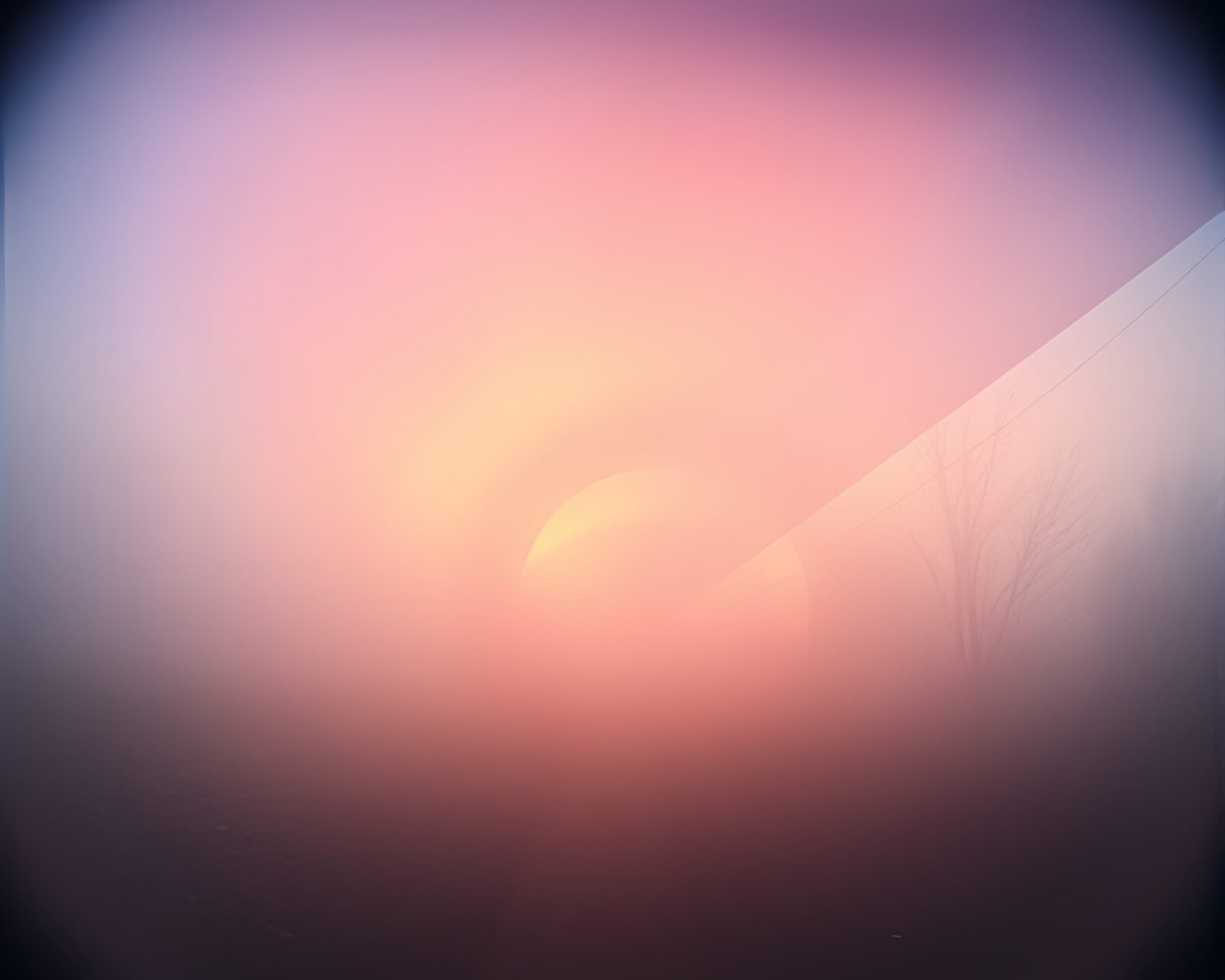 Misty glass tunnel at sunrise with fisheye distortion