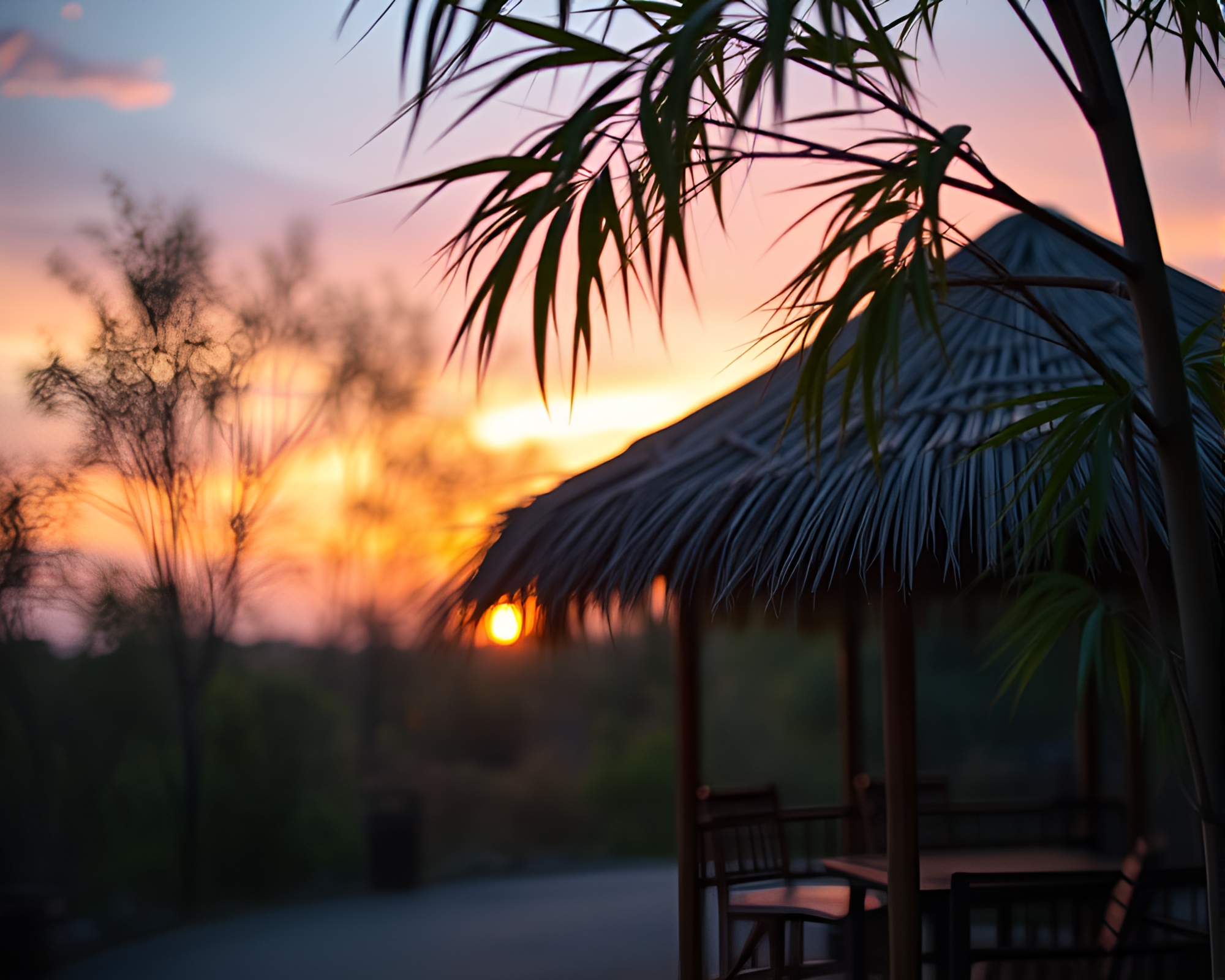 Peaceful Bamboo Hut in Warm Sunset Glow – free AI stock image