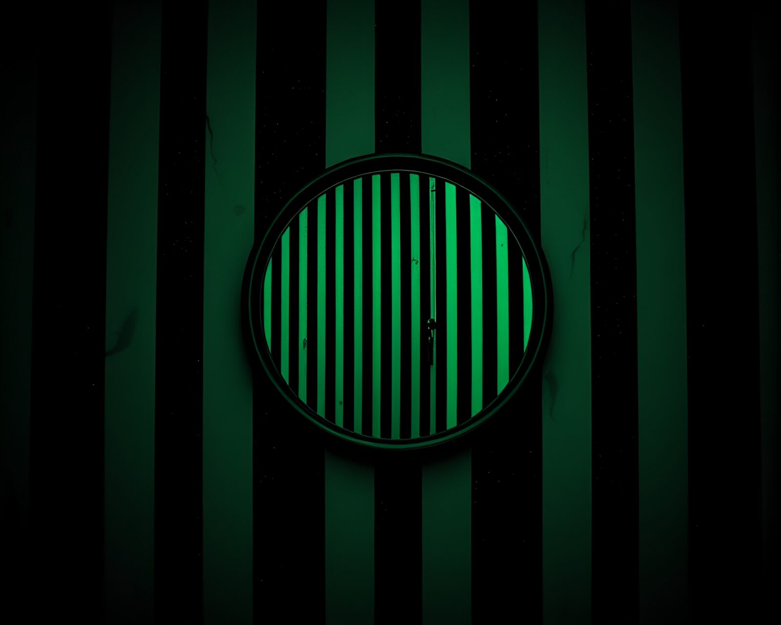 Stipple-shaded mirror reflecting hauntingly vivid striped patterns