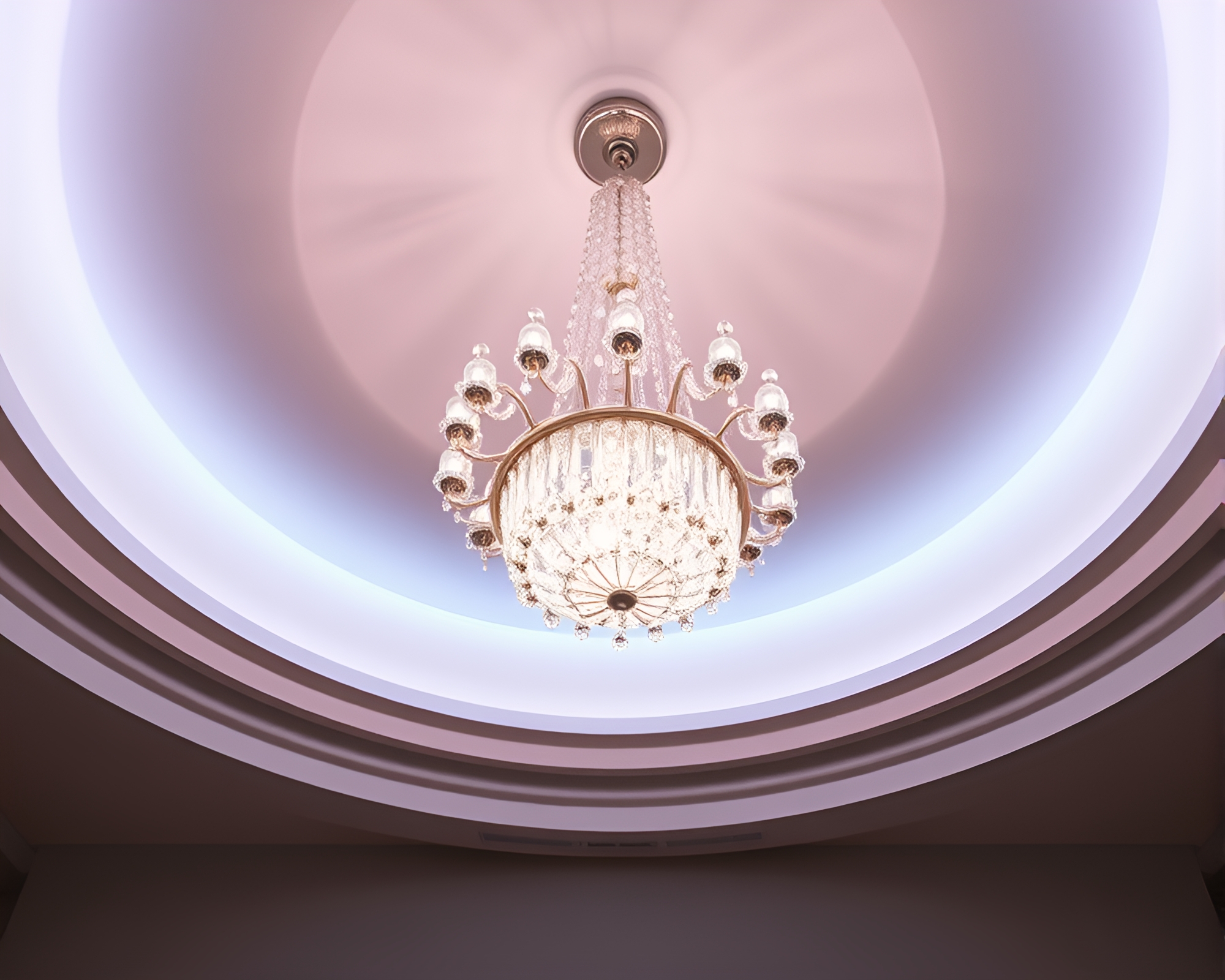 Ethereal Chandelier Illuminated by Pastel Spotlights – free AI stock image