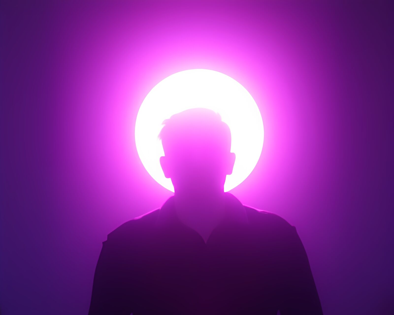Shadowy silhouette surrounded by glowing iridescent magic symbols