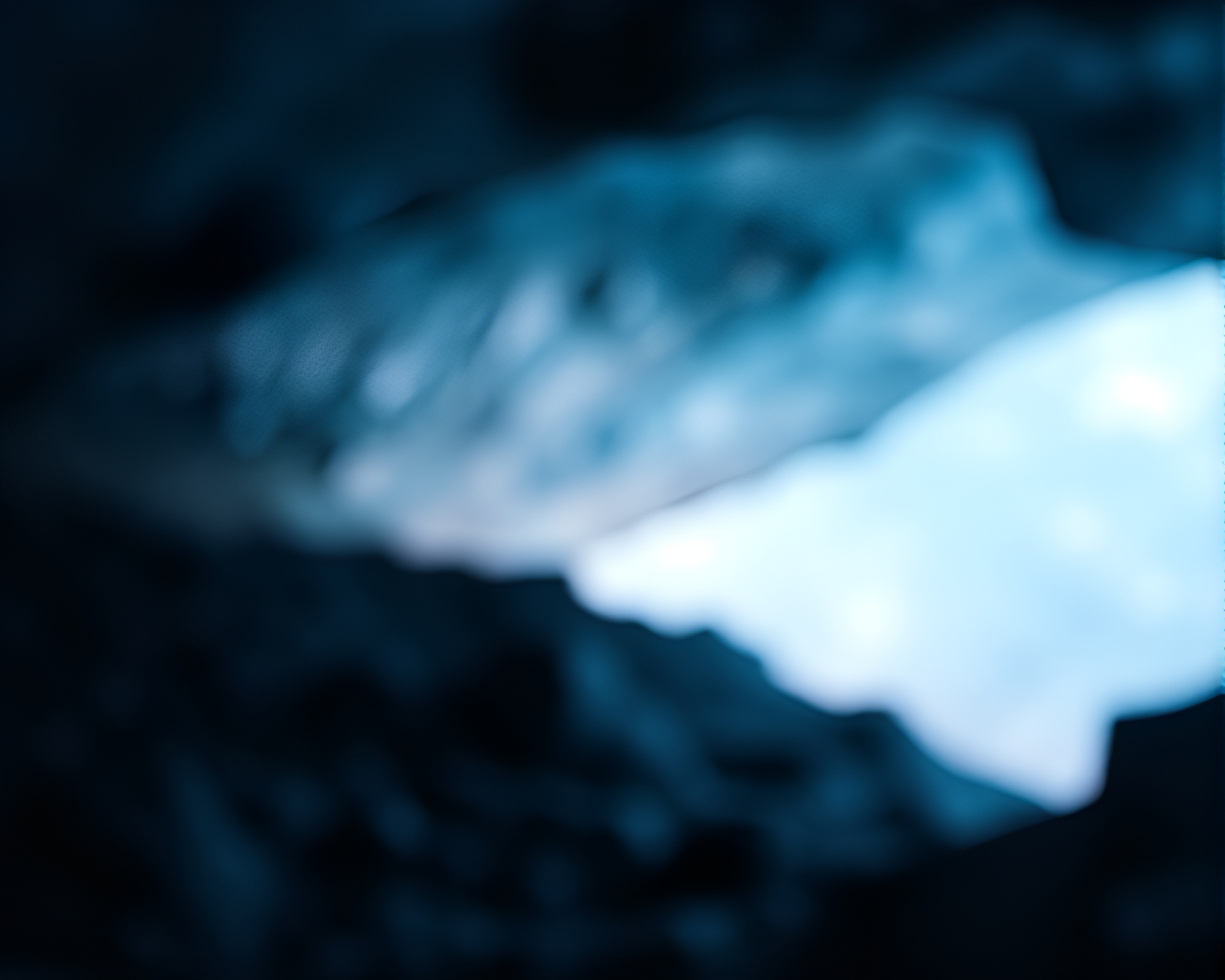 Prismatic Glacial Cave with Bokeh Foreground – free AI stock image