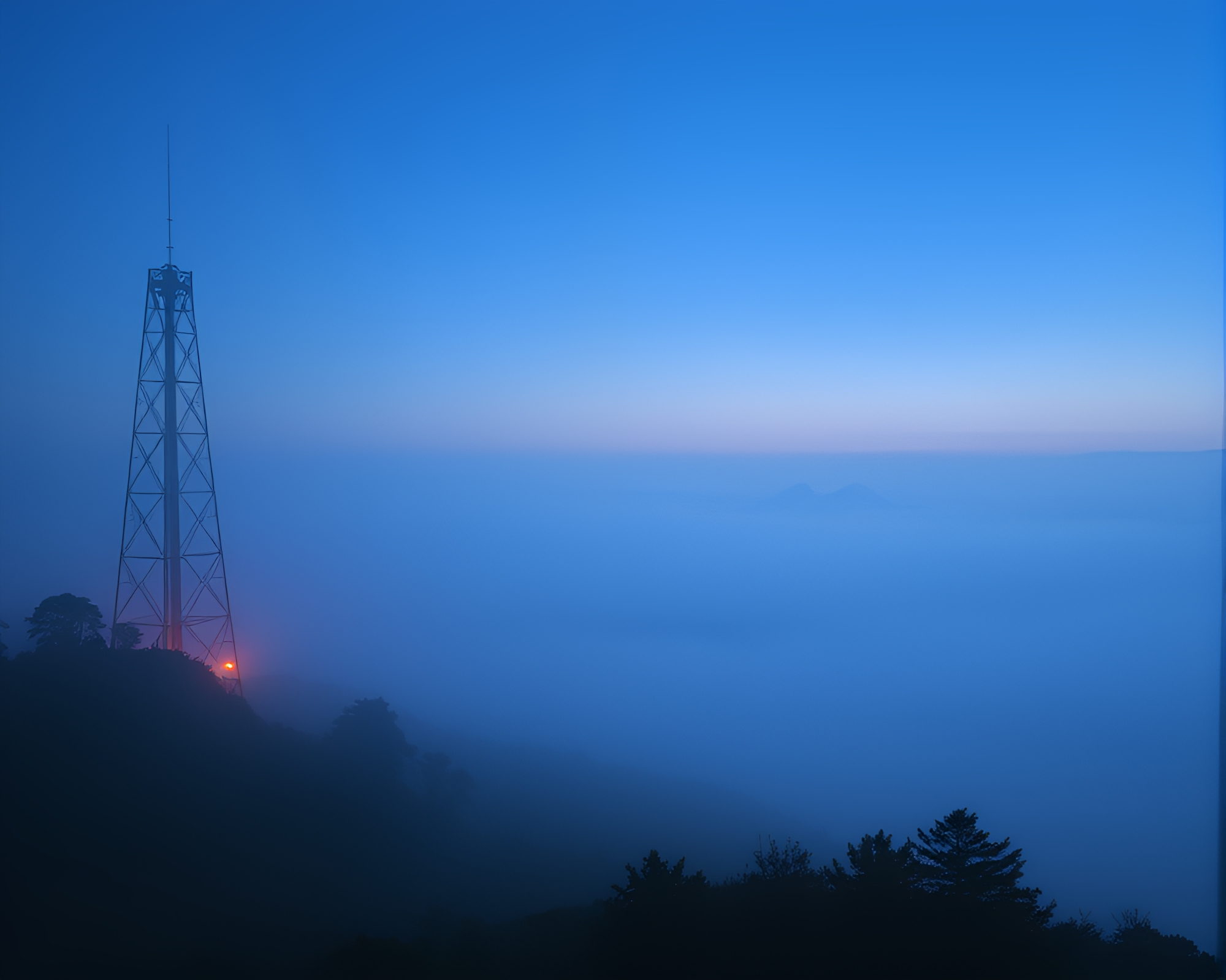 Tower Embraced by Dawn Mist and Leading Contours – free AI stock image
