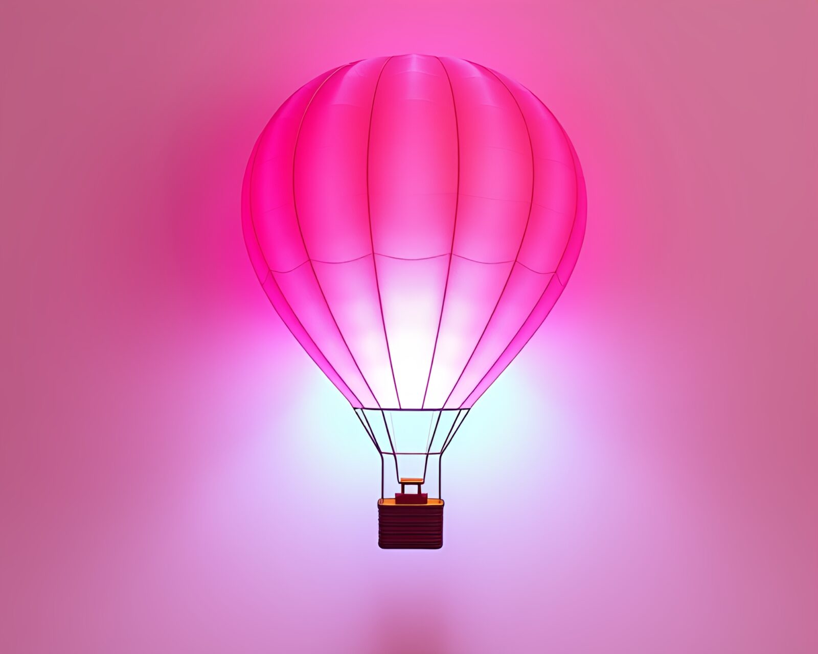 Vibrantly colored hot air balloon surrounded by torn paper pieces