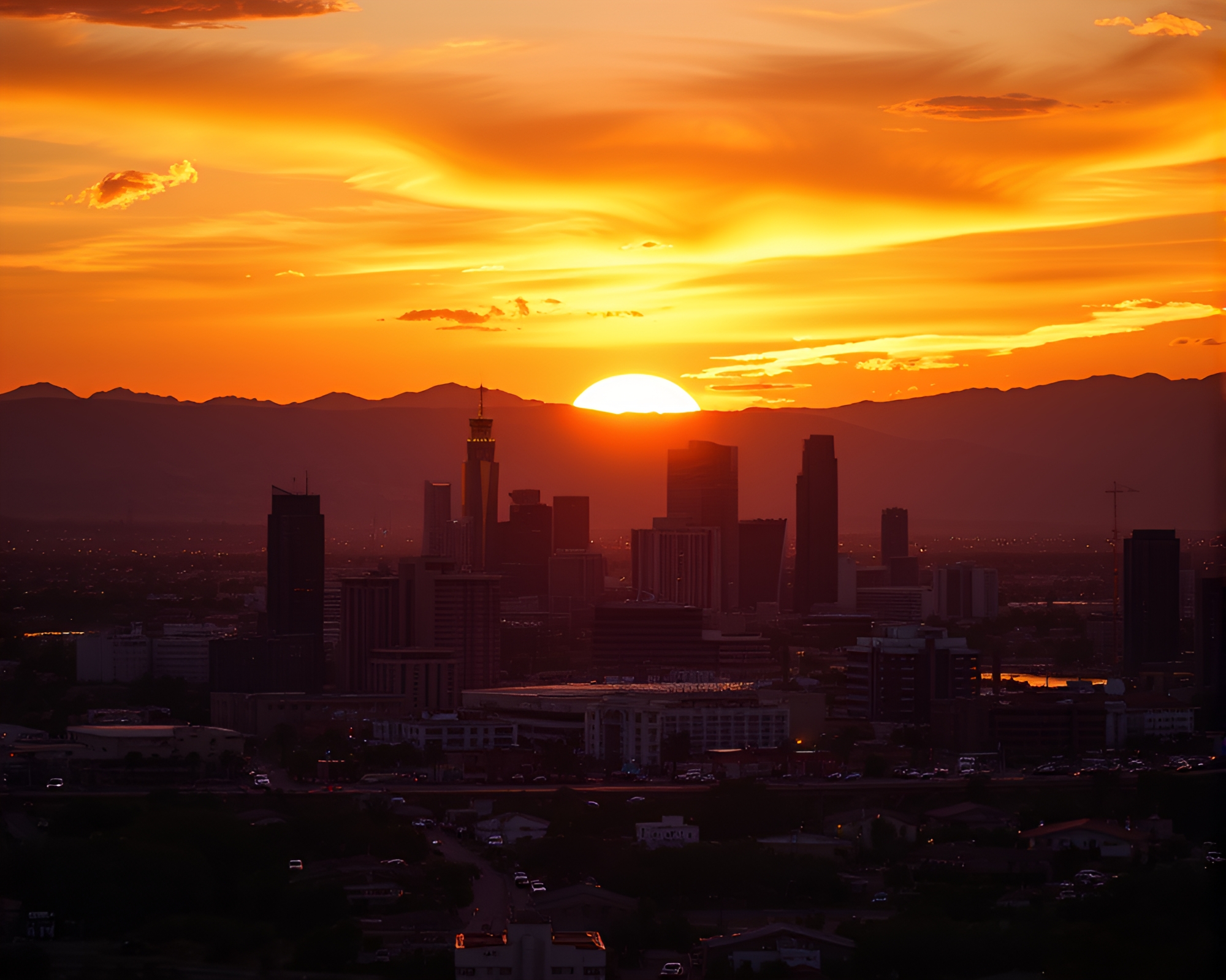Golden Spiral Phoenix in Sunset Cityscape – free AI stock image