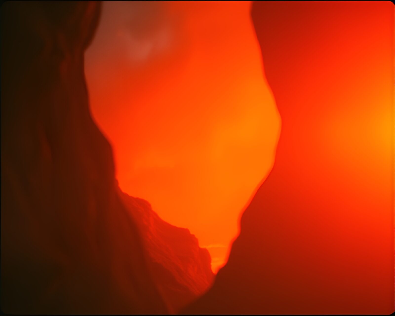 A mesmerizing canyon scene with bokeh effect in burnt orange hues