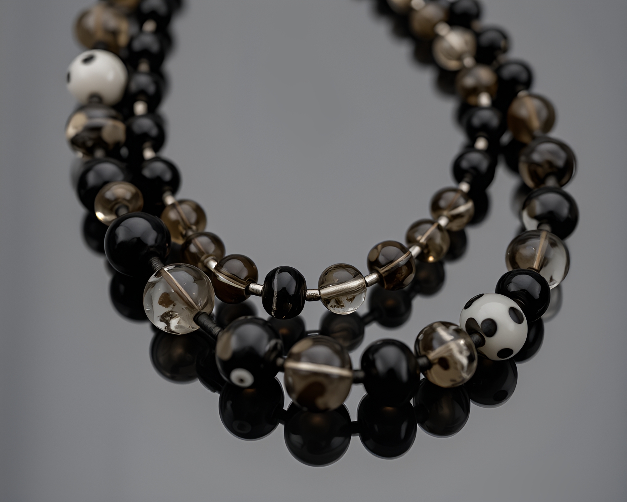 Glistening Necklace adorning Wet Glass Beads in Sepia – free AI stock image