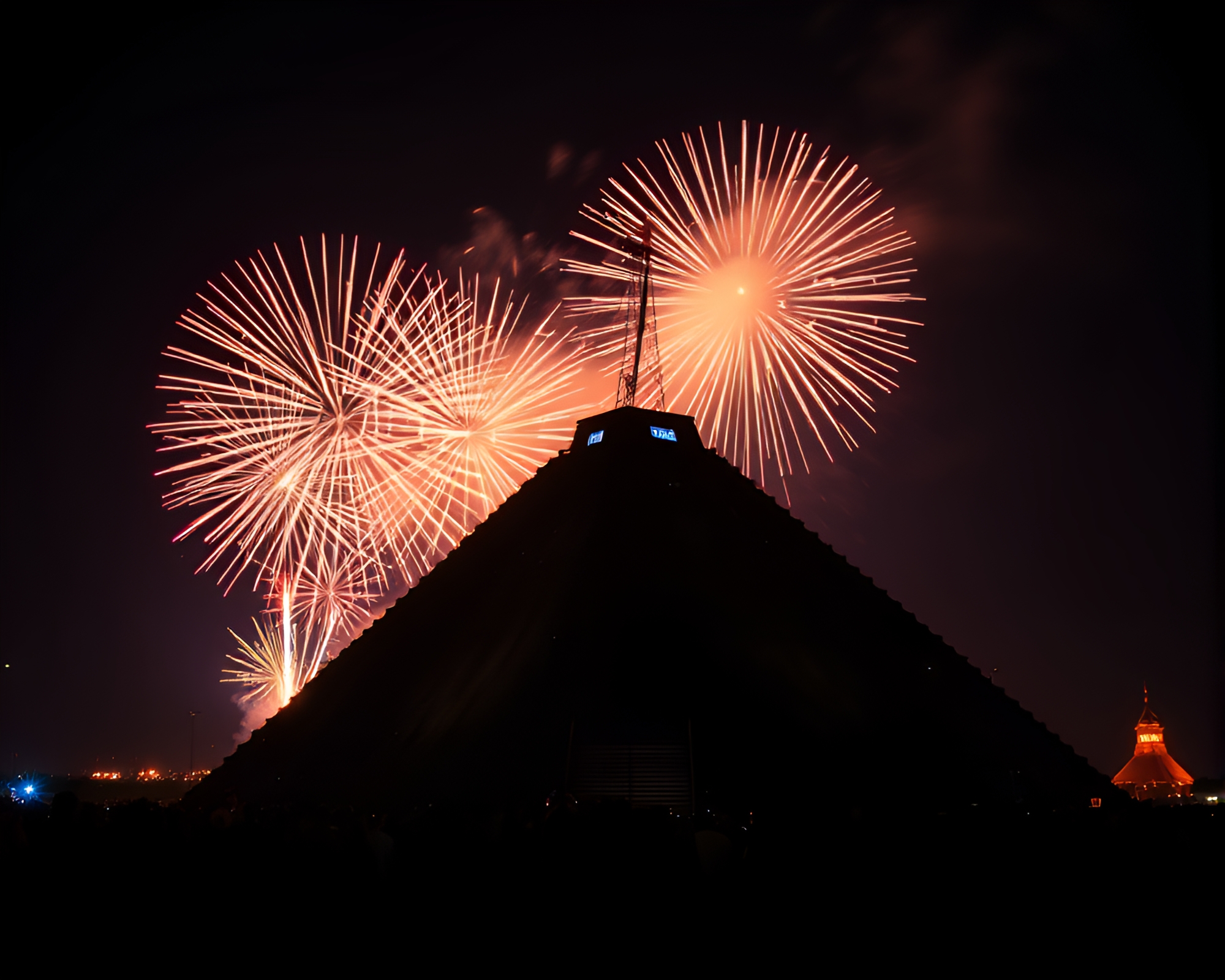 Spectacular Festival Fireworks Illuminating Pyramid – free AI stock image