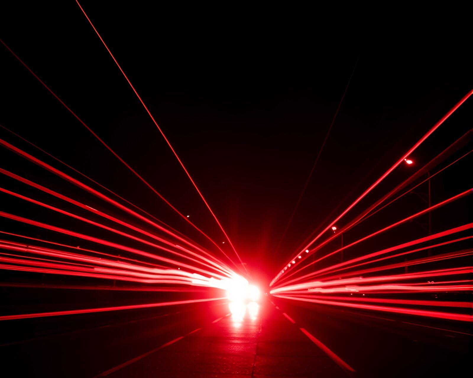 A telephoto photograph of swirling light trails around AI brain